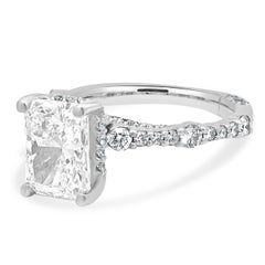 14 Karat White Gold Radiant Cut and Round Diamond Hidden Halo Engagement Ring