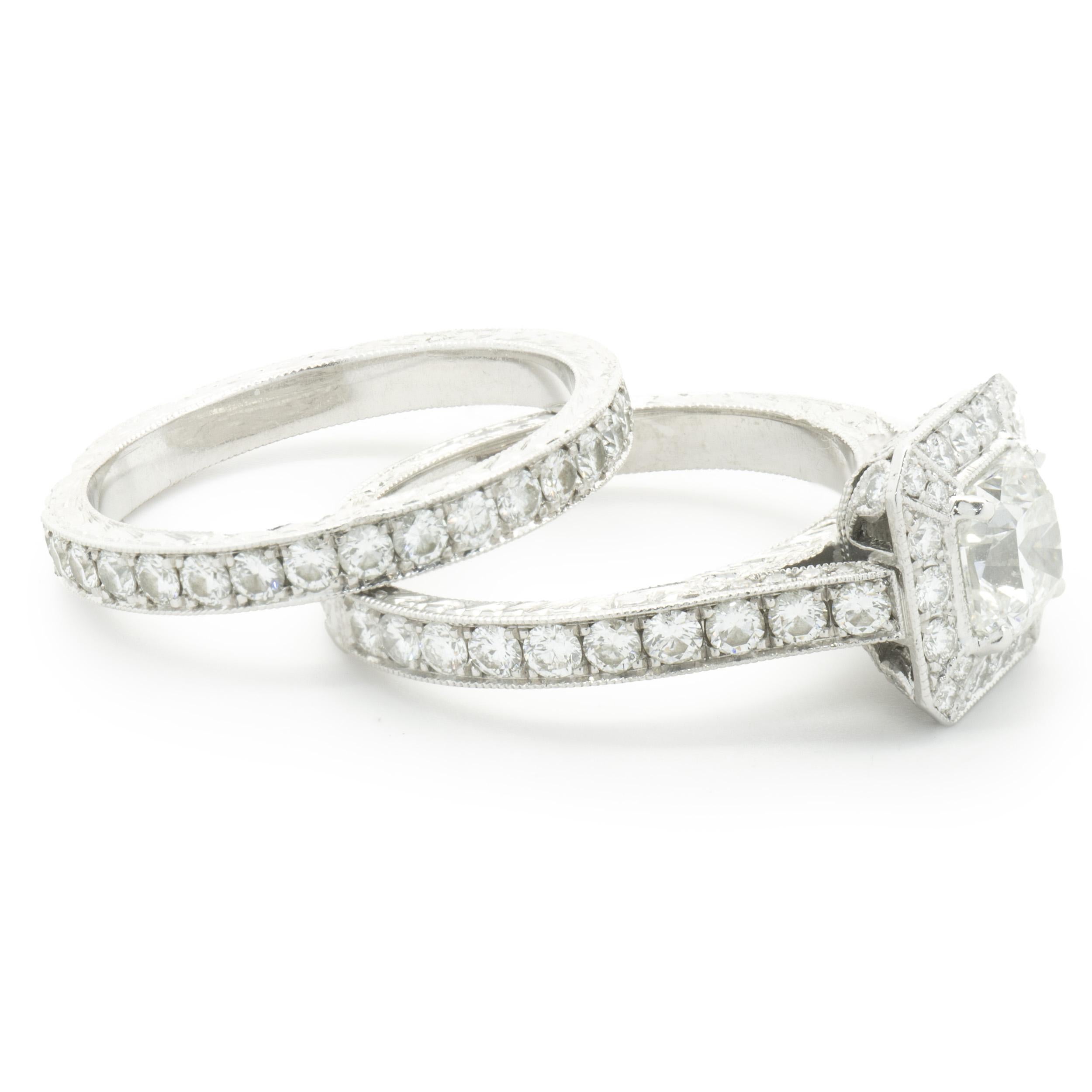 Designer: M. Chai
Material: 14K white gold
Diamond: 1 radiant cut = 1.08ct
Color: H
Clarity: SI1
GIA: 1126389020
Diamond: 99 round brilliant cut = 1.64cttw
Color: H
Clarity: SI1-2
Dimensions: ring top measures 10mm wide
Ring Size: 7 (complimentary