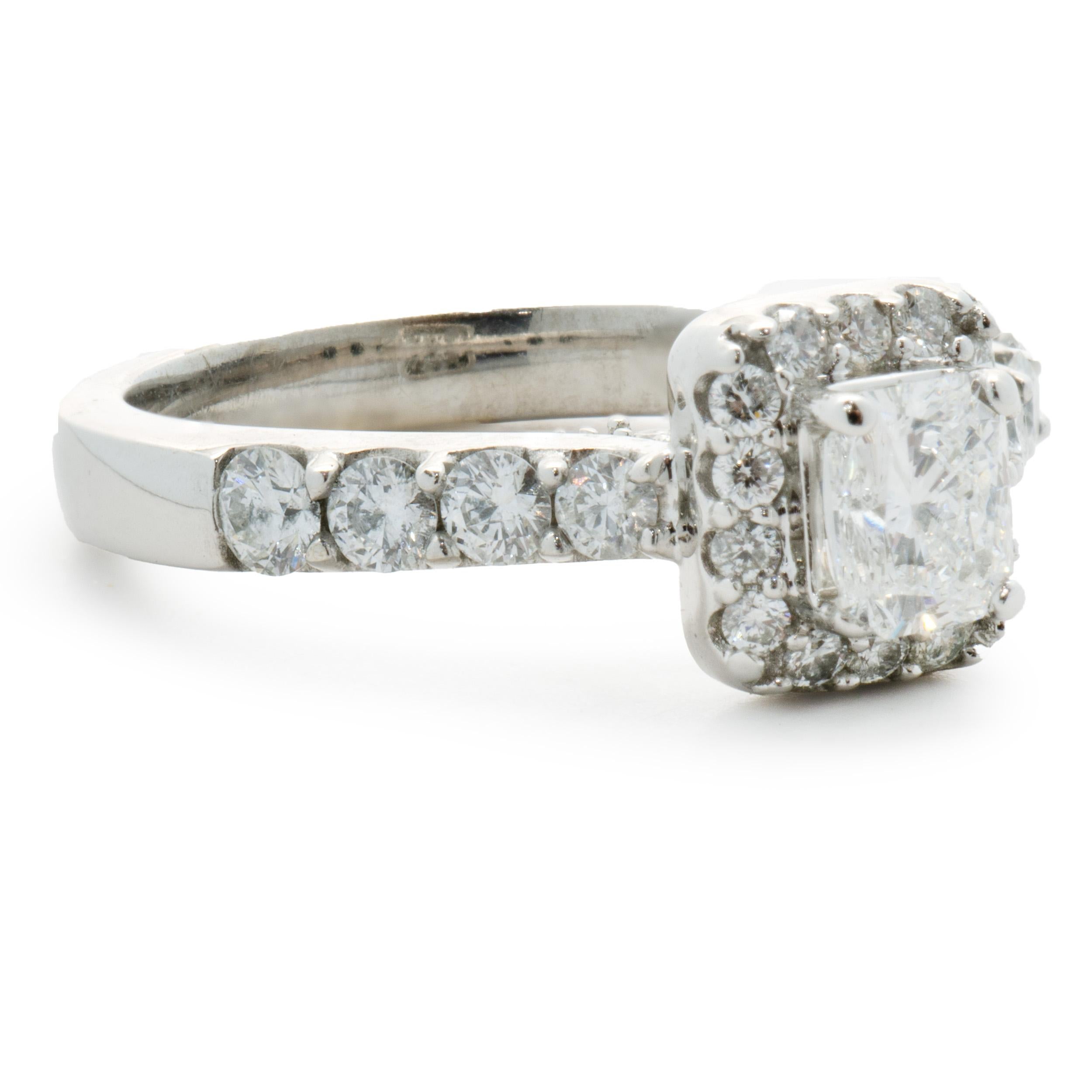 Designer: Custom
Material: 14K white gold
Diamond: 1 radiant cut = 0.55ct
Color: H
Clarity SI2
Diamond: 30 round brilliant cut = 1.00cttw
Color: H
Clarity: SI1-2
Dimensions: ring top measures 8.5mm wide
Ring Size: 7 (complimentary sizing