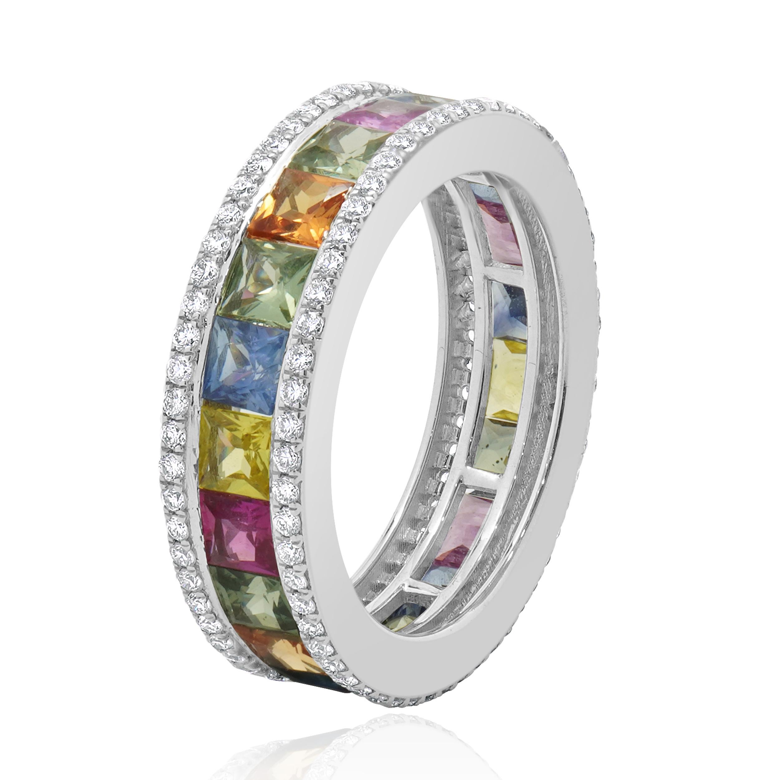 Designer: custom
Material: 14k white gold
Diamonds: round brilliant= 0.61cttw 
Color: G
Clarity: VS-SI1
Rainbow Sapphires: 3.65cttw
Dimensions: ring top measures 6mm wide
Ring Size: 6 (complimentary sizing available)
Weight: 4.61 grams
