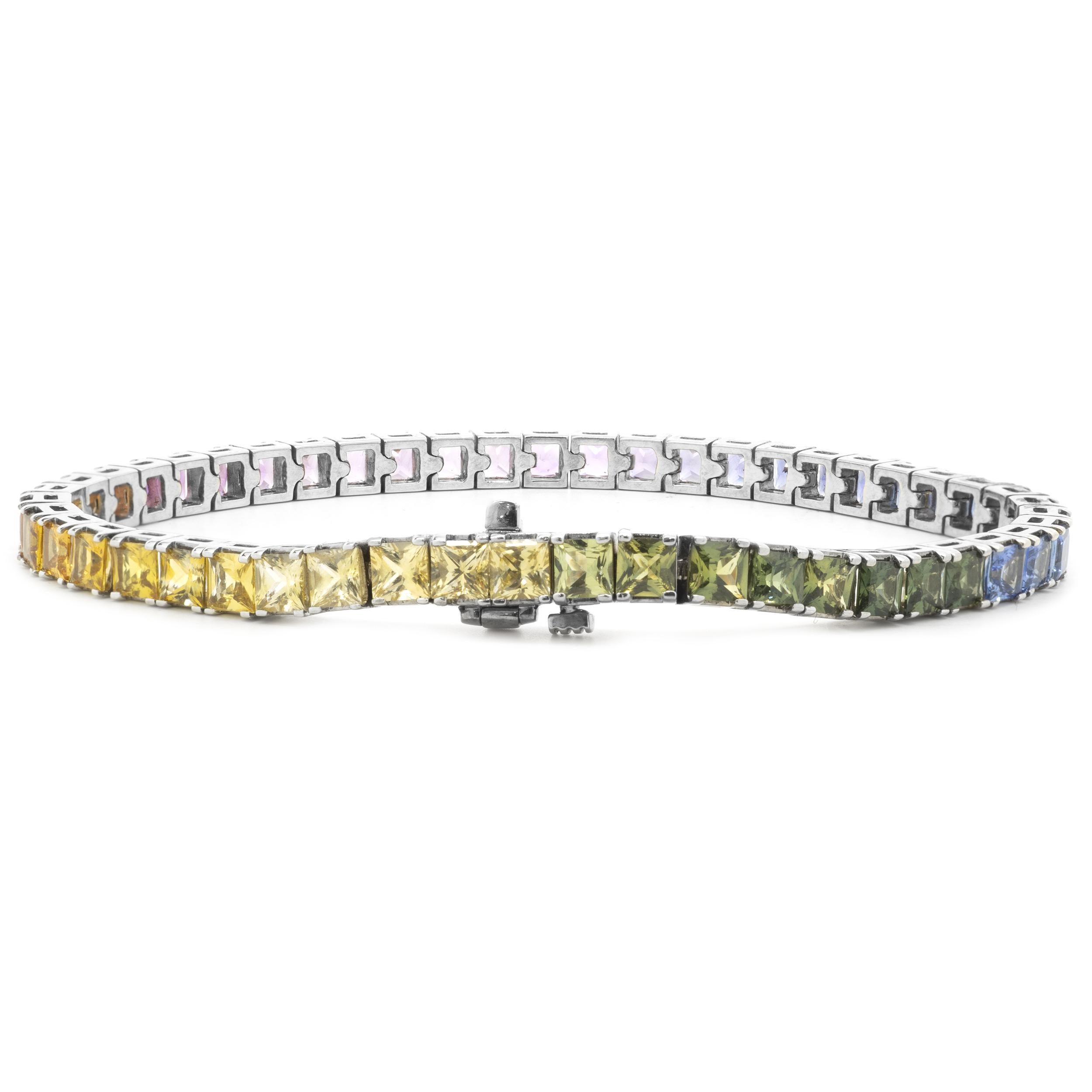 Material: 14K white gold
Sapphire: 49 princess cut = 14.70cttw
Color: Natural Rainbow Sapphires
Clarity: AAA+
Dimensions: bracelet will fit a 7-inch wrist
Weight: 14.70 grams
