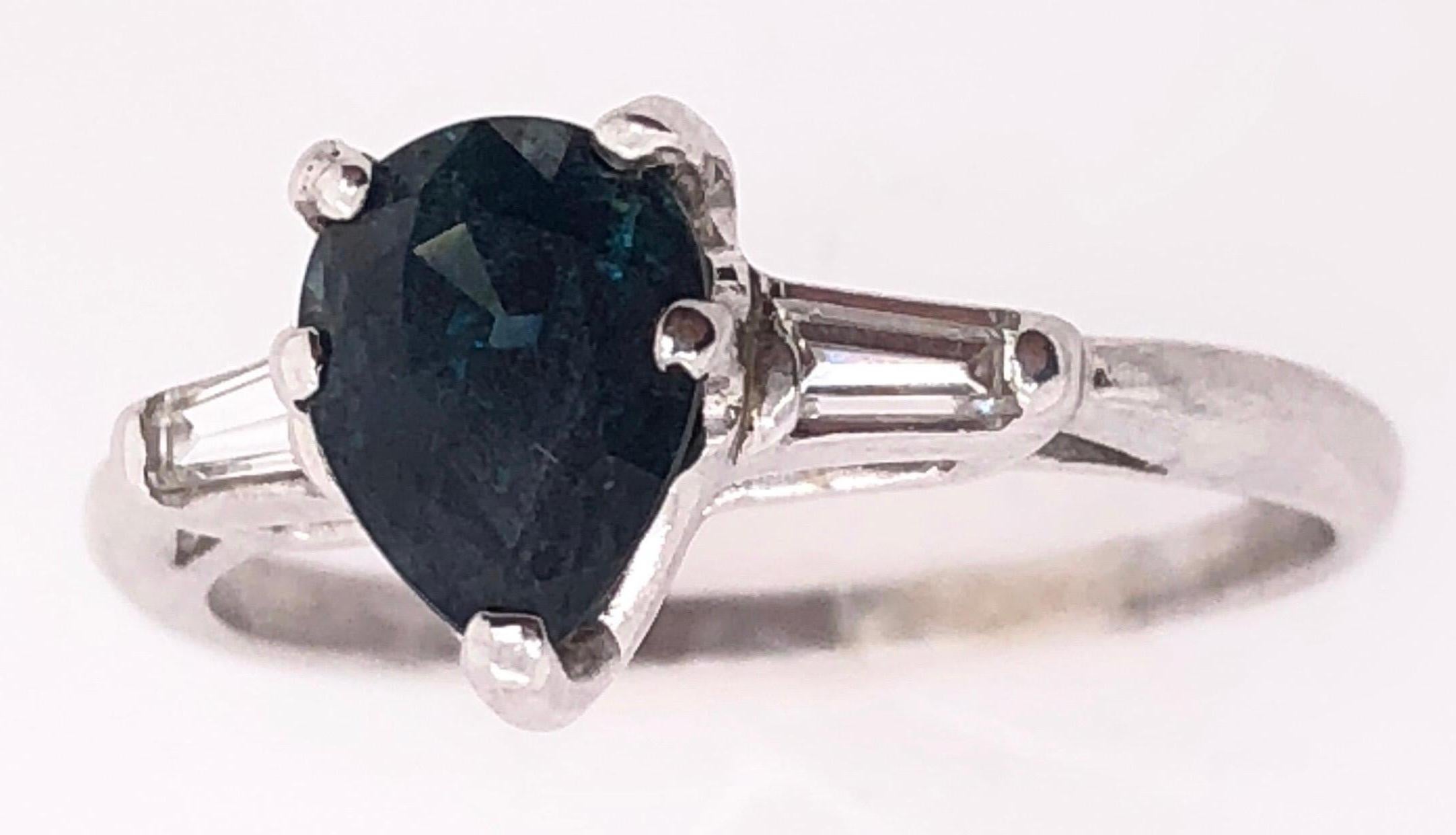 14 Karat White Gold Free Form Sapphire Ring with Diamonds.
Size 7
3 grams total weight.