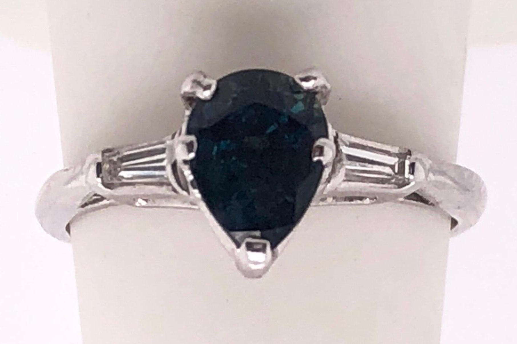 Modern 14 Karat White Gold Ring with Center Pear Shape Sapphire And Diamond Accents For Sale
