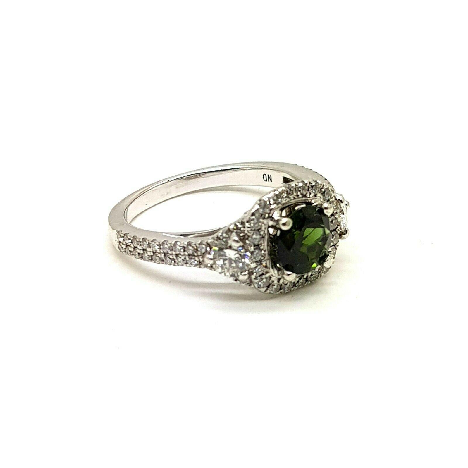 14 Karat White Gold Ring with Green Tourmaline in Center with Halo Diamonds In New Condition For Sale In Los Angeles, CA
