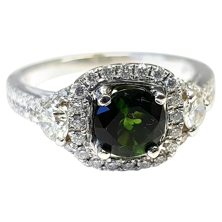 14 Karat White Gold Ring with Green Tourmaline in Center with Halo Diamonds For Sale