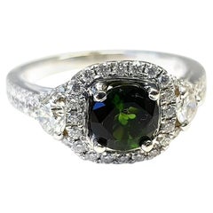 14 Karat White Gold Ring with Green Tourmaline in Center with Halo Diamonds