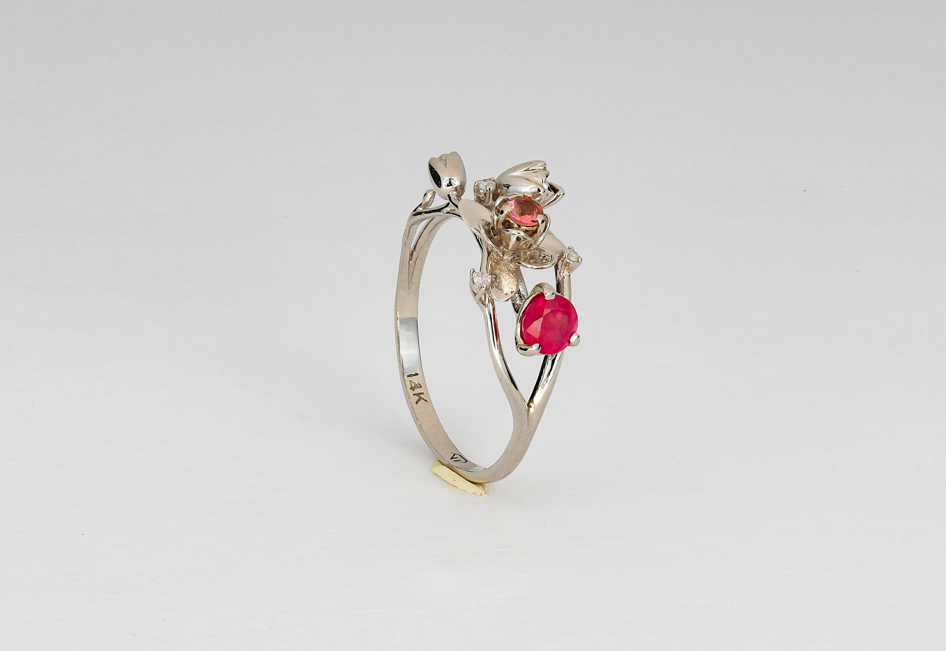 14 karat white gold ring with genuine ruby, sapphire and diamonds. Wild Orchid gold ring. July birthstone.
Weight: 2.2 g. depends from size
Central stone: Genuine ruby
Weight: 0.45 ct in total
Cabochon cut, color - red
Clarity: Transparent with