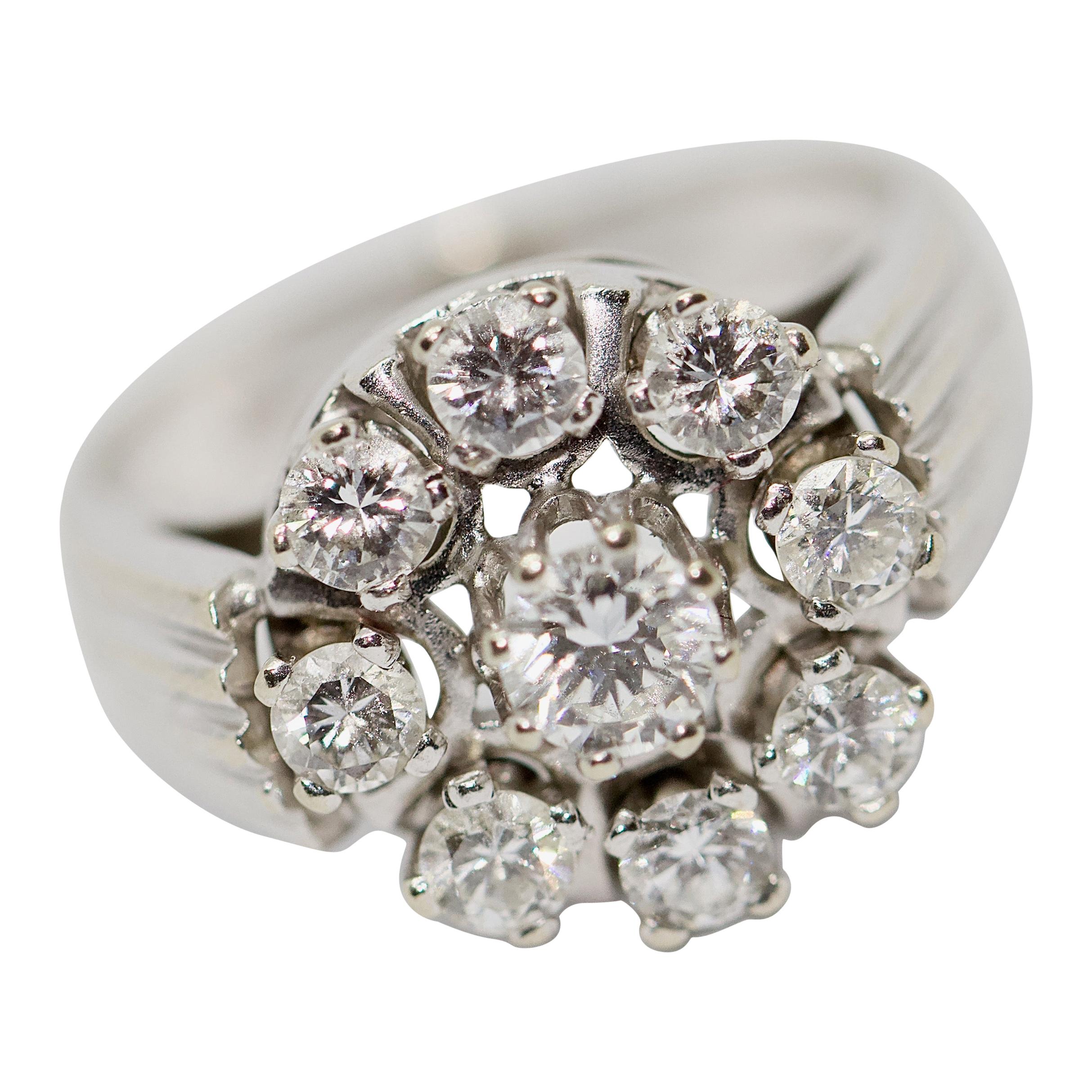14 Karat White Gold Ring with Solitaire Diamonds
