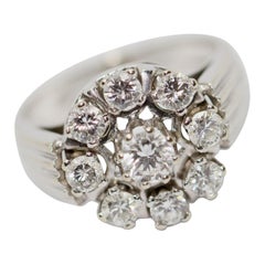 14 Karat White Gold Ring with Solitaire Diamonds