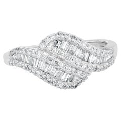 14 Karat White Gold Round and Baguette Diamond Knot Ring