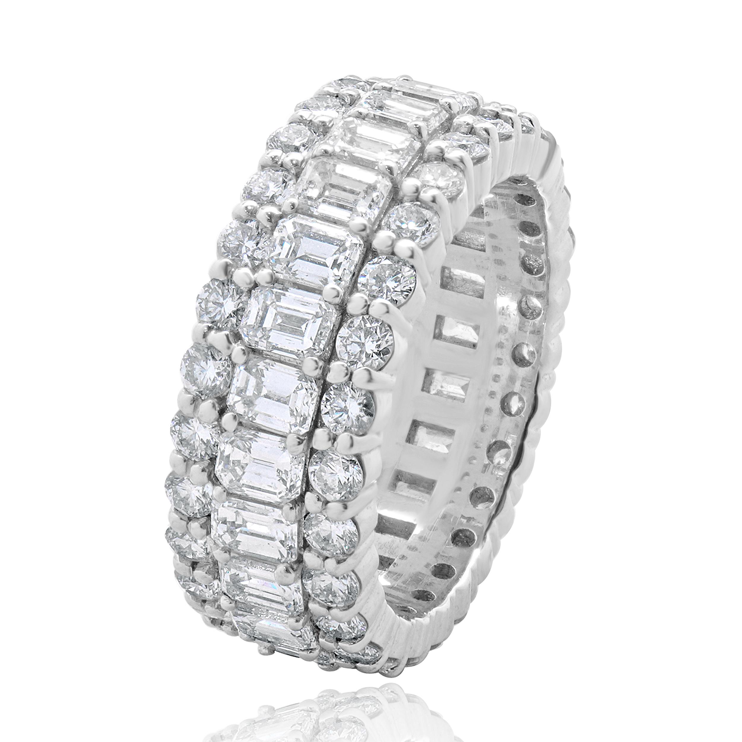 Designer: custom
Material: 14K white gold  
Diamond:  round brilliant cut = 1.75cttw
Color: G
Clarity: SI1-2
Diamond:  emerald cut = 3.50cttw
Color: G
Clarity: SI1-2
Size: 6.5 sizing available 
Weight: 9.91 grams