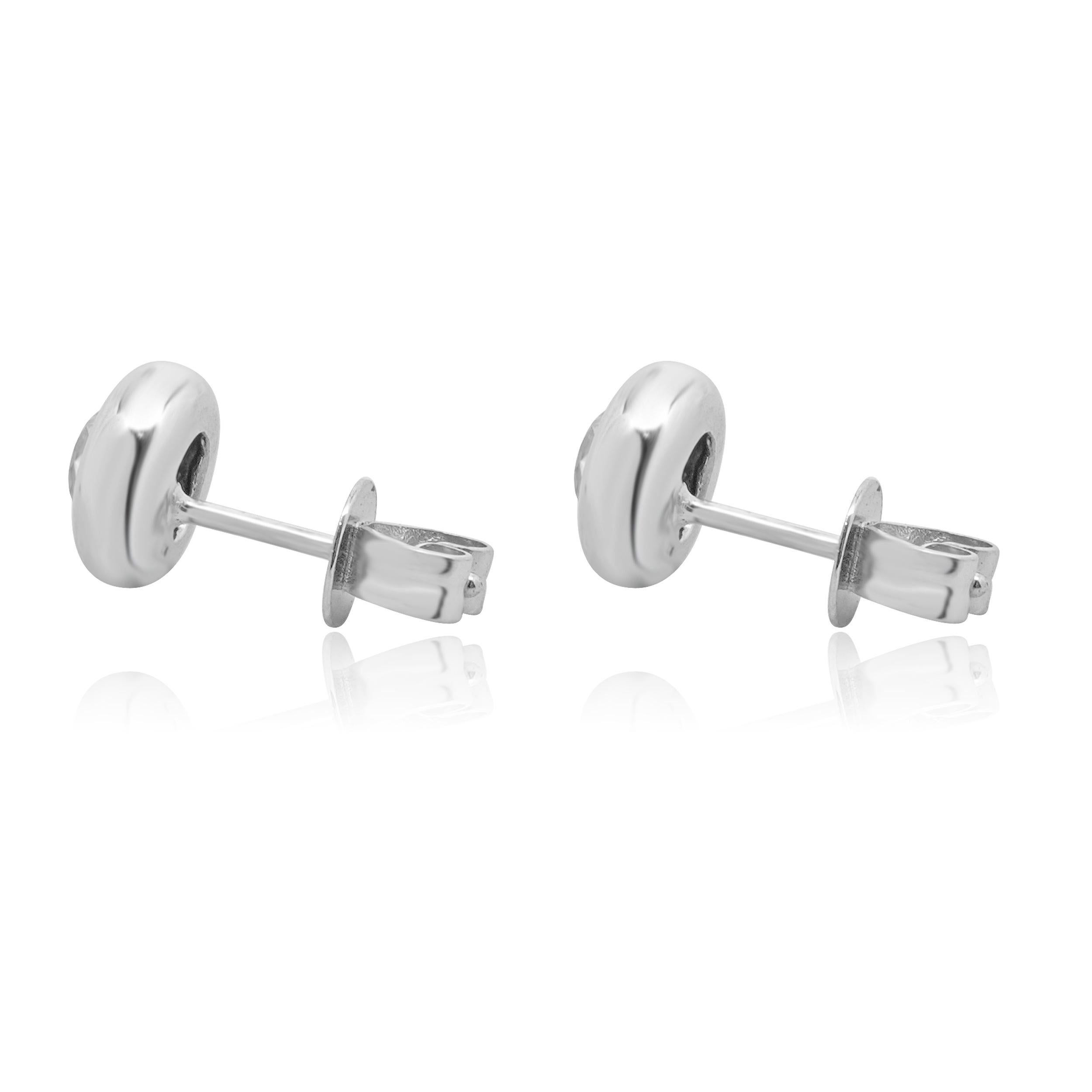Material: 14K white gold
Diamonds: 2 round brilliant cut = 0.40cttw
Color: J
Clarity: I2
Dimensions: earrings measure approximately 12.95mm in diameter
Fastenings: friction backs
Weight: 2.20 grams
