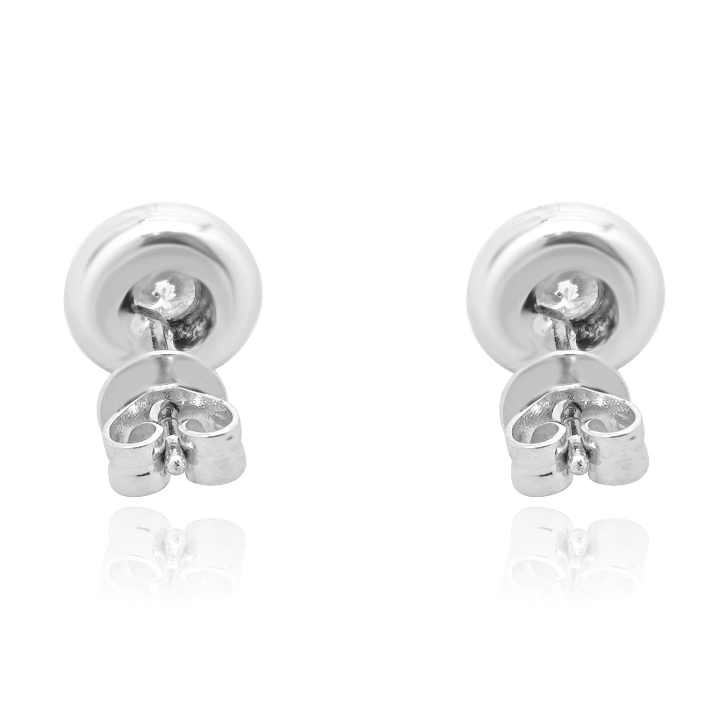 Round Cut 14 Karat White Gold Round Brilliant Cut Bezel Set Diamond Stud Earrings For Sale