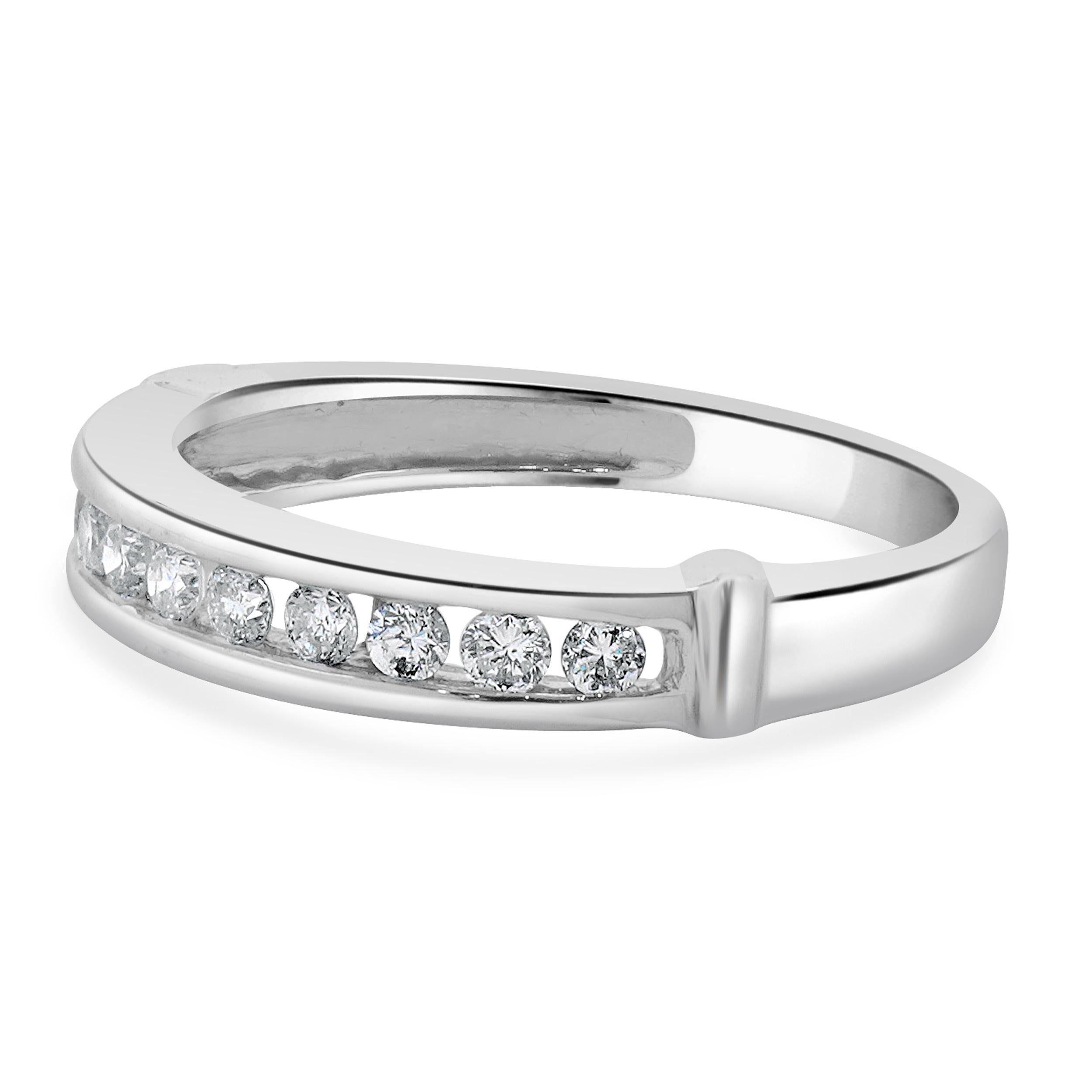 Designer: Custom
Material: 14K white gold
Diamonds: 11 round brilliant cut = 0.22cttw
Color: H
Clarity: SI2-I1
Size: 4.5 sizing available 
Dimensions: ring top measures 3mm in width
Weight: 2.02 grams
