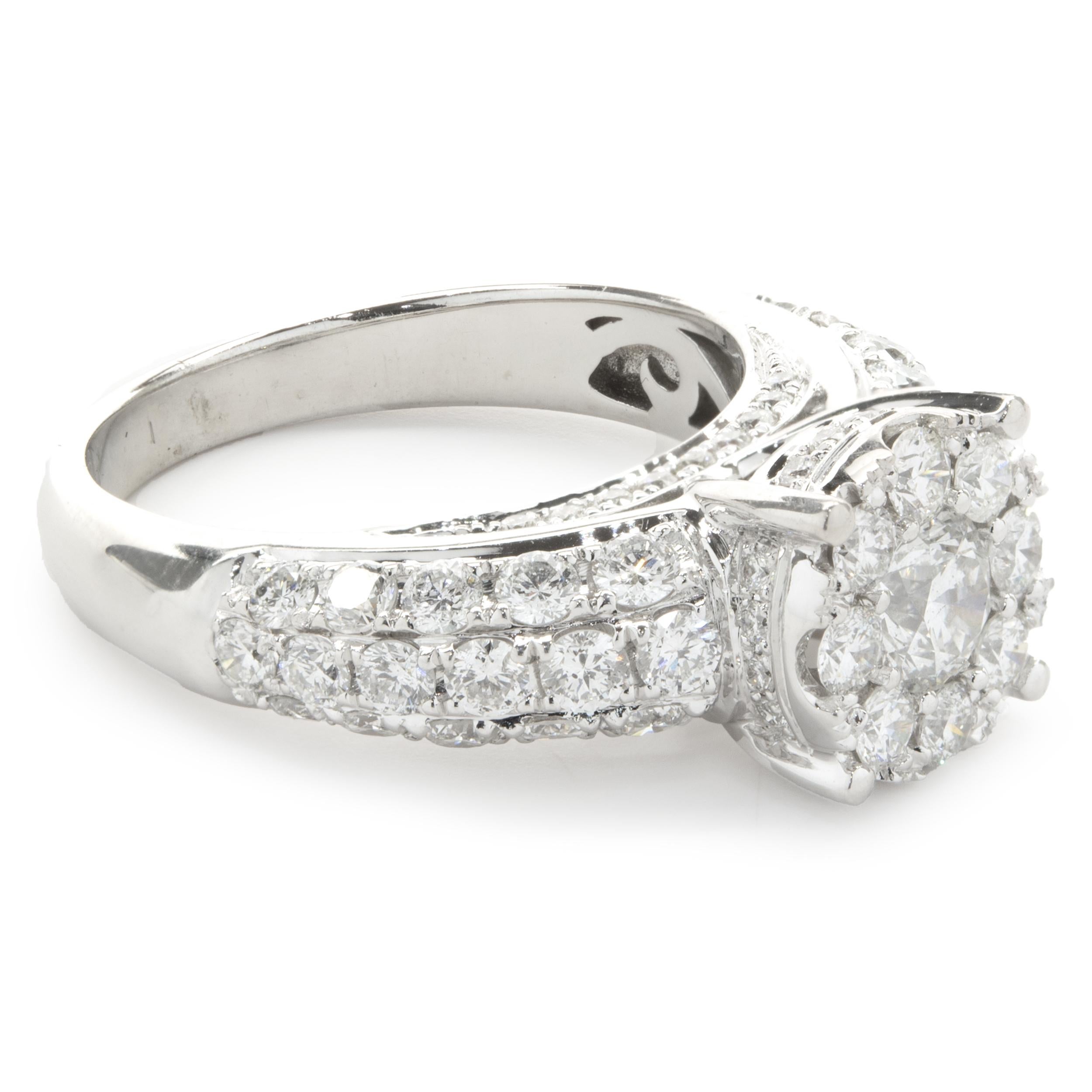 Designer: custom
Material: 14K white gold
Diamond: 1 round brilliant = 0.45ct
Color: H
Clarity: SI1
Diamond: 78 round brilliant cut = 1.40cttw
Color: H
Clarity: SI1-2
Ring Size: 6 (please allow up to 2 additional business days for sizing