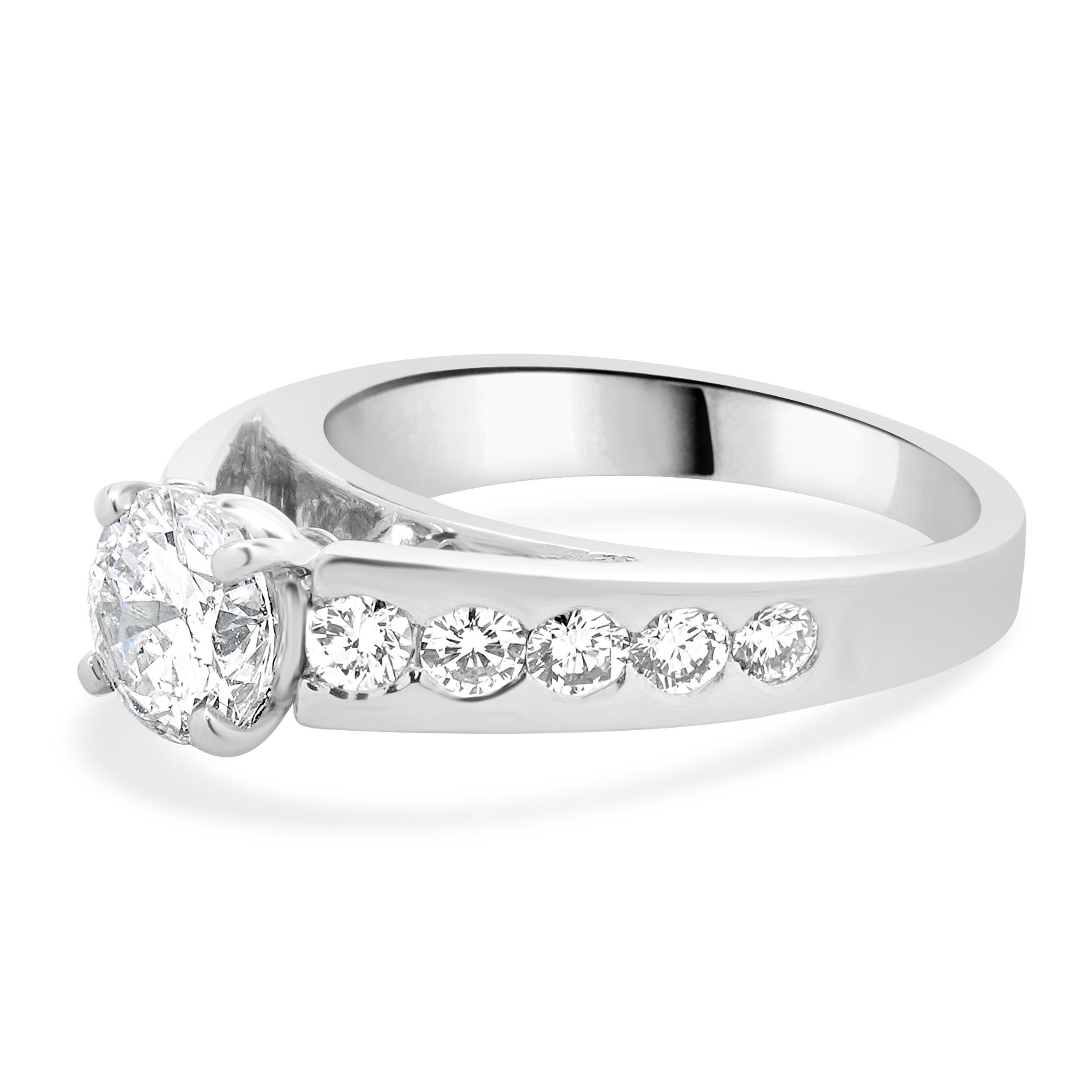 Designer: custom
Material: 14K white gold
Center Diamond: 1 round brilliant cut = 1.01ct
Color : F
Clarity : SI1 (Clarity Enhanced)
EGL: 2056109528
Diamond: 10 round brilliant cut = 0.60cttw
Color: G
Clarity: SI1
Size: 6.25 complimentary sizing