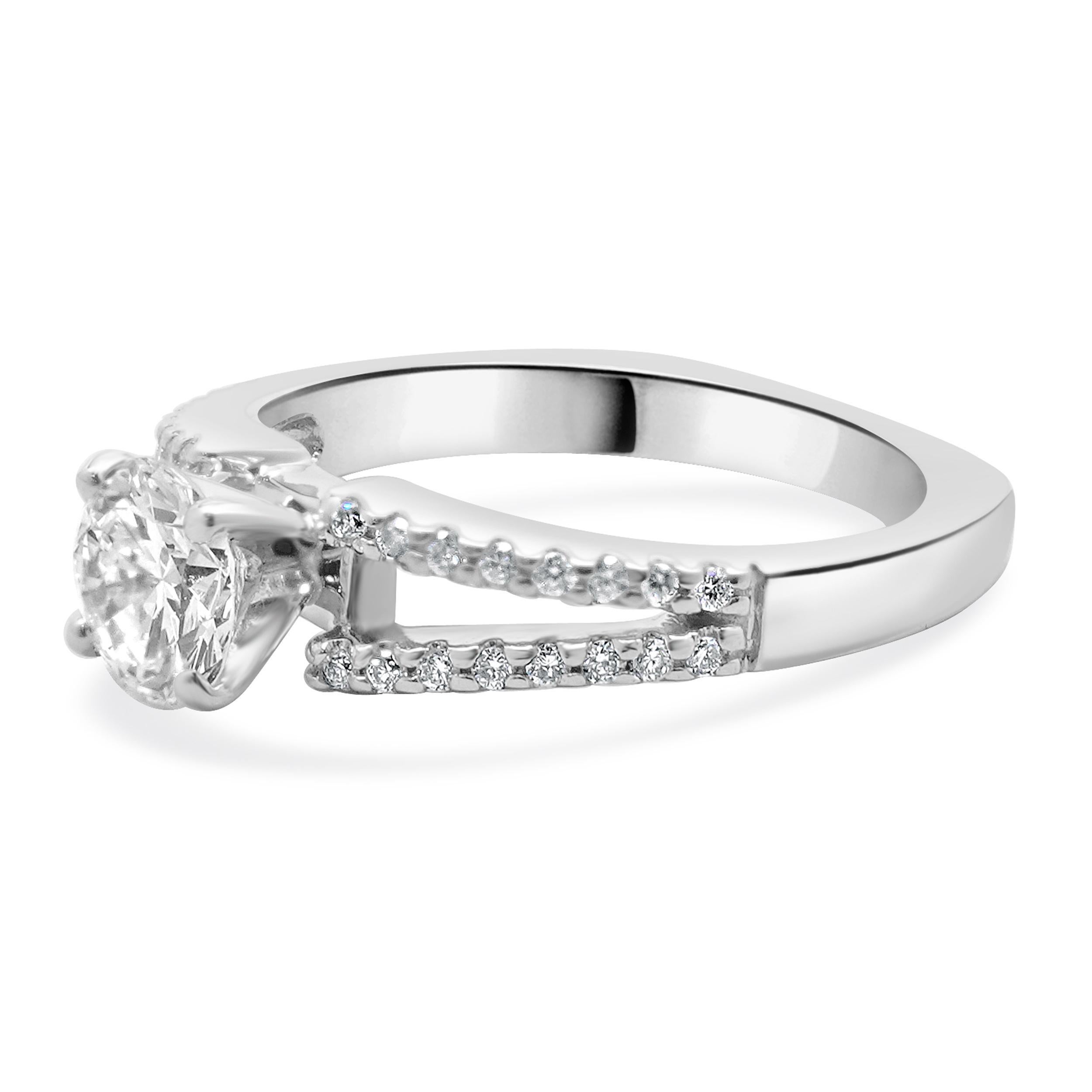 Designer: custom
Material: 14K white gold
Center Diamond: 1 round brilliant cut = 0.95ct
Color : F
Clarity : VS2
GIA: 5231143621
Diamond: 36 round brilliant cut = 0.36cttw
Color : G
Clarity : VS1-2
Size: 6.5 complimentary sizing available 
Weight: