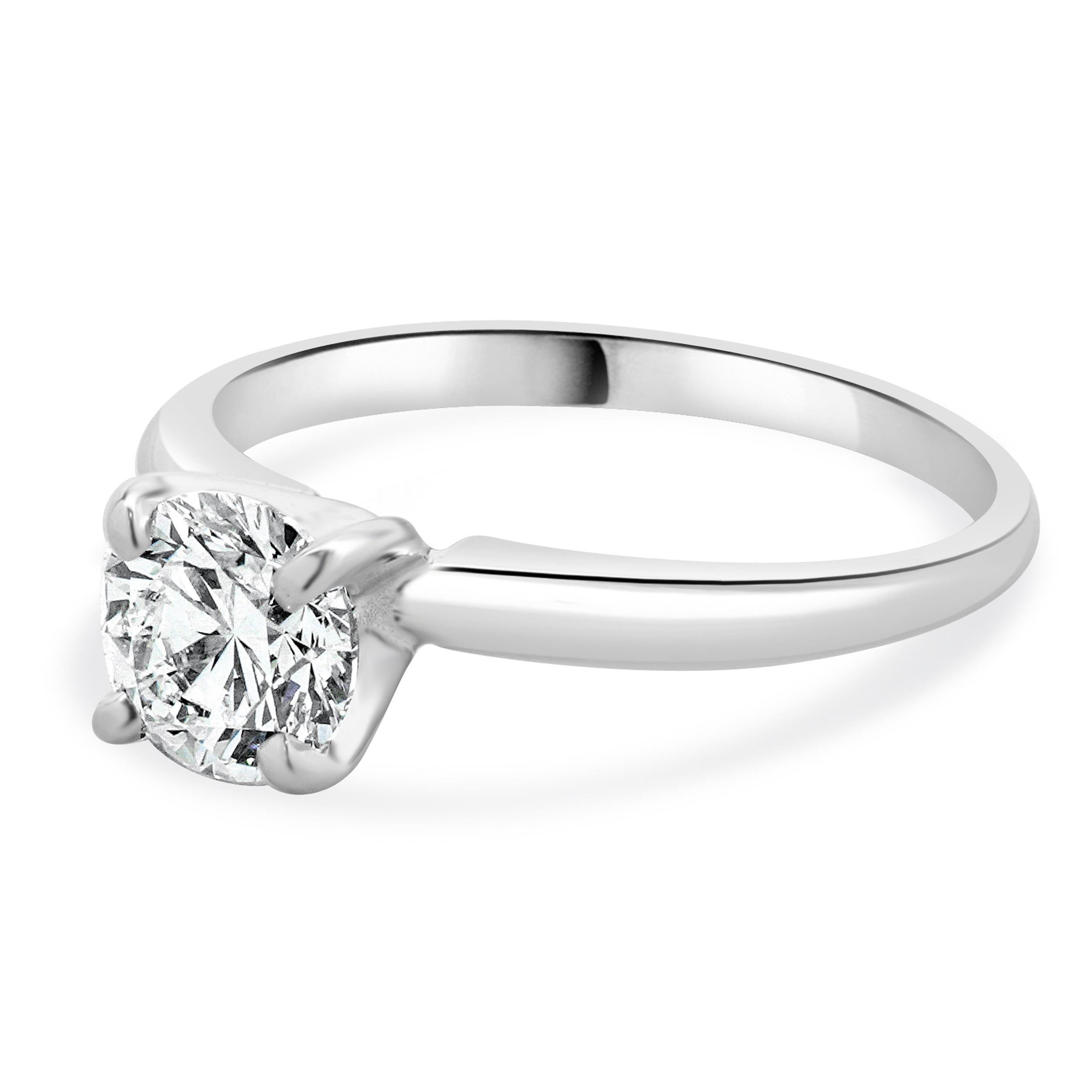 Designer: custom
Material: 14K white gold
Center Diamond: 1 round brilliant cut = 0.75ct
Color : H
Clarity : VS2
Size: 5.5 complimentary sizing available 
Weight: 2.03 grams