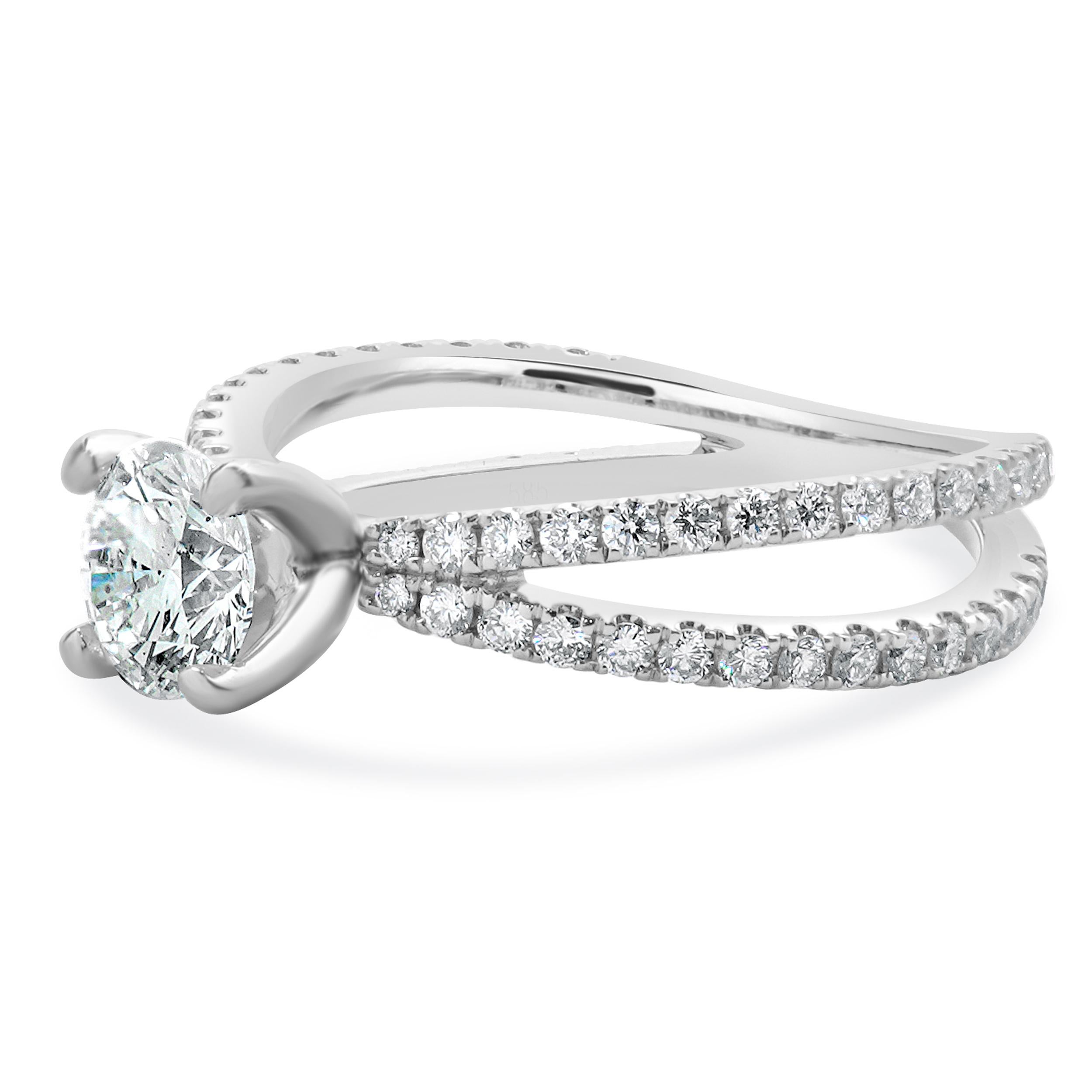 Material: 14K white gold
Center Diamond: 1 round brilliant cut = 0.68ct
Color: G
Clarity: SI1
Diamond: 60 round brilliant cut = 0.50cttw
Color: G
Clarity: SI1
Ring Size: 6 (please allow up to 2 additional business days for sizing