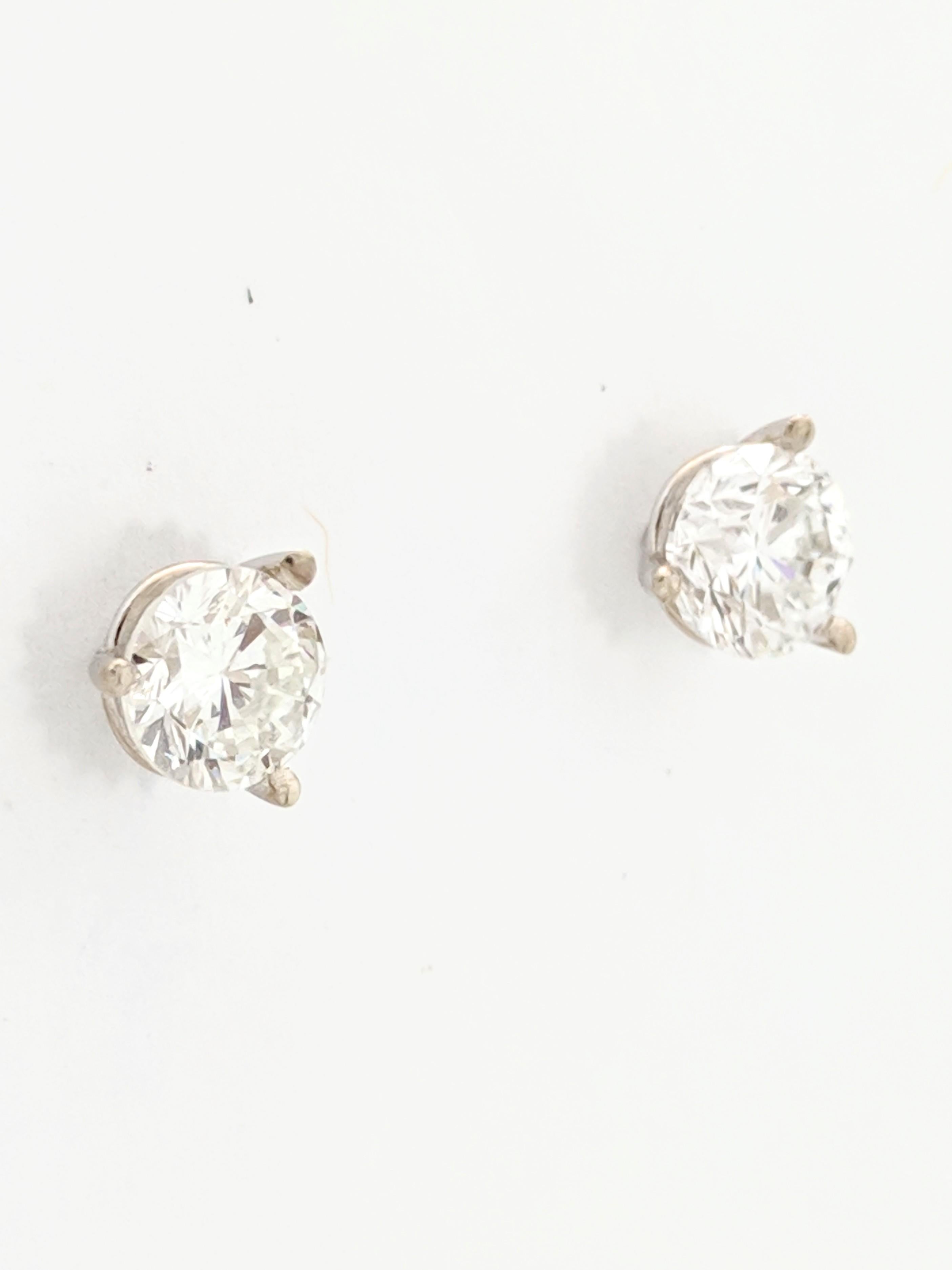 Women's or Men's 14 Karat White Gold Round Brilliant Cut Diamond Stud Earrings 1.29 Carat SI1/H For Sale