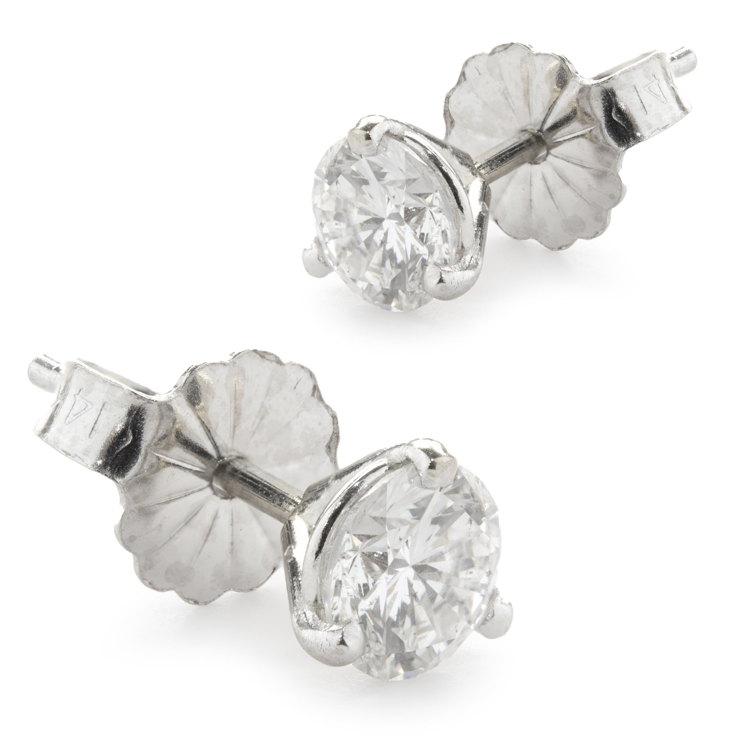 Material: 14k white gold
Diamond: 2 round brilliant cut = 0.70cttw 
Color: F / G
Clarity: VS2-SI1
Dimensions: earrings measure approximately 4.90mm in diameter
Fastenings: post with friction backs
Weight: 0.78 grams
