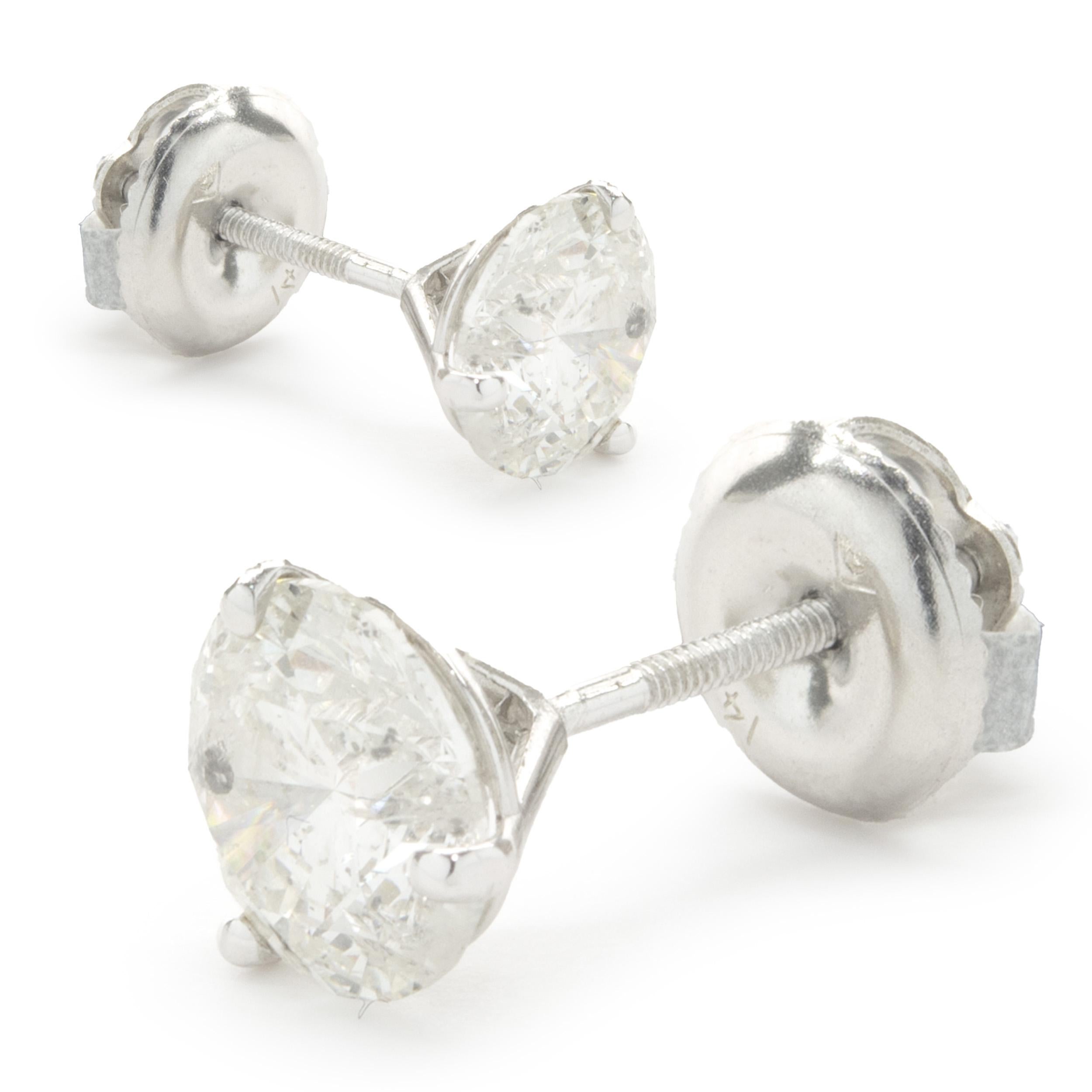 Material: 14k white gold
Diamonds: 2 round brilliant cut = 2.09cttw
Color: G / H
Clarity: I1
Dimensions: earrings measure approximately 6.76mm in diameter
Fastenings: post with screw backs
Weight: 1.15 grams