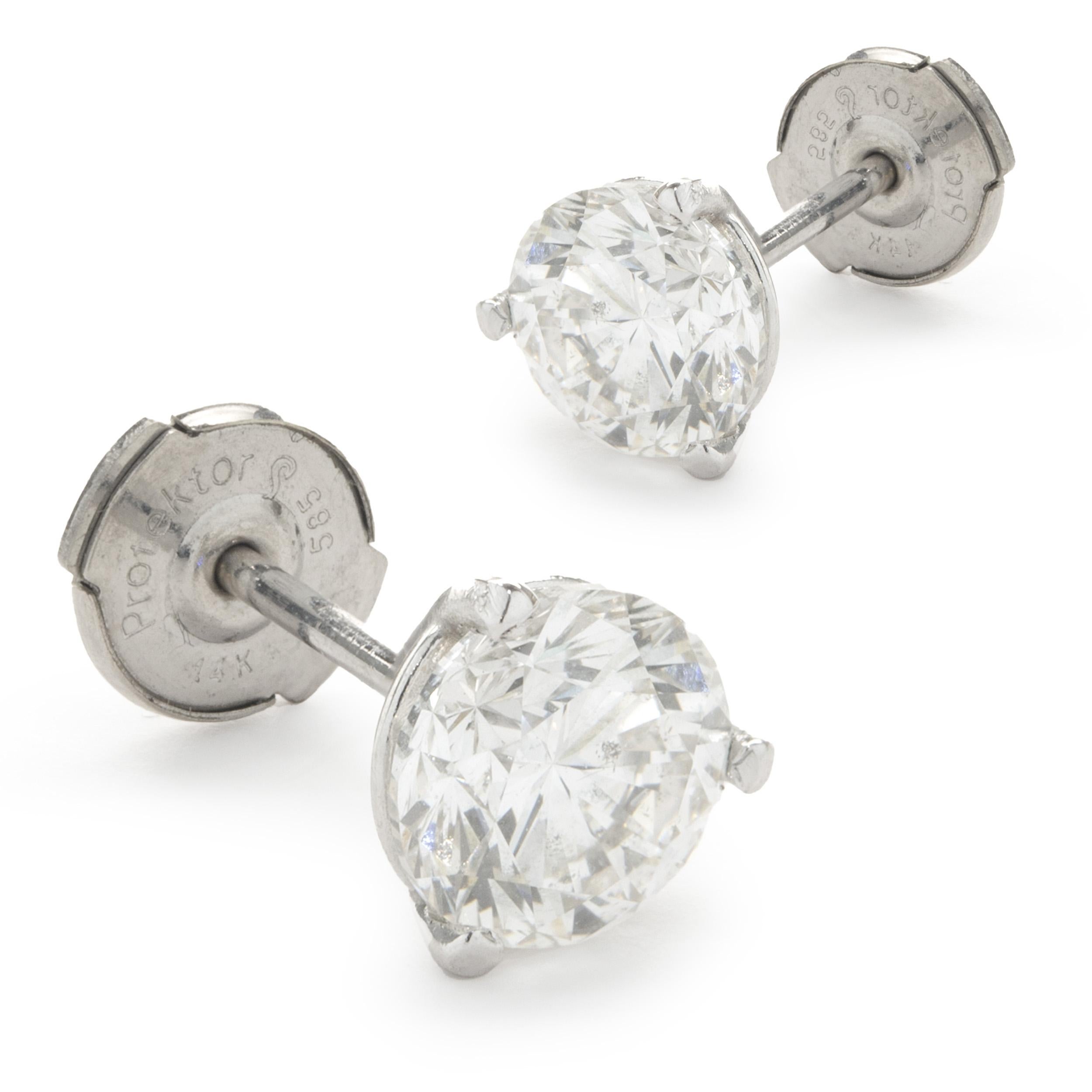 Material: 14k white gold
Diamonds: 2 round brilliant cut = 2.16cttw
Color: I / K
Clarity:SI2-I1
Dimensions: earrings measure approximately 6.40mm in diameter
Fastenings: post with lapousette backs
Weight: 1.55 grams