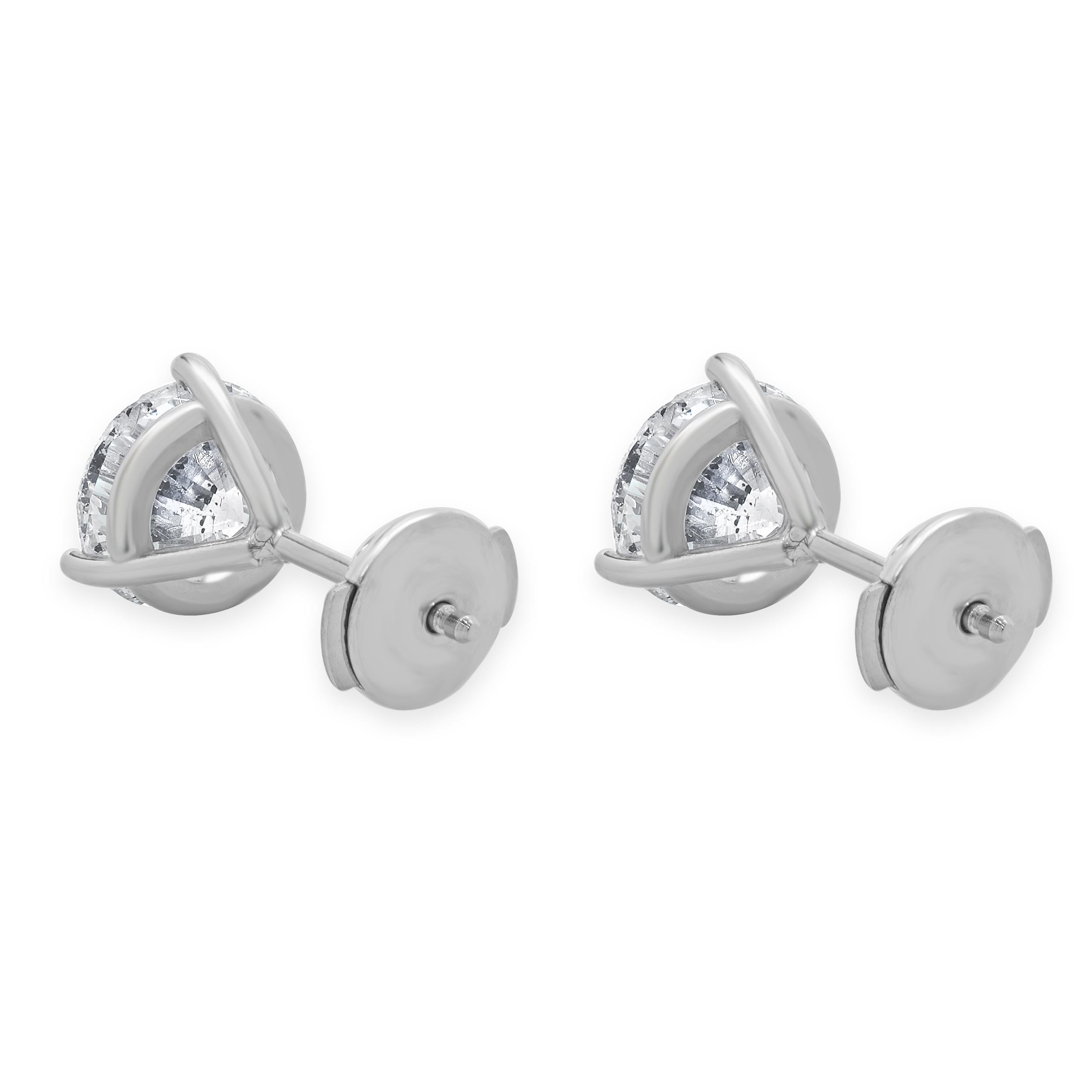 Material: 14K white gold
Diamonds: 1 round brilliant cut = 1.55ct
Color: G
Clarity: I1
Diamond: 1 round brilliant cut = 1.65ct
Color: G
Clarity: I1
Dimensions: earrings measure approximately 8mm in diameter
Fastenings: protektor
Weight: 1.97 grams
