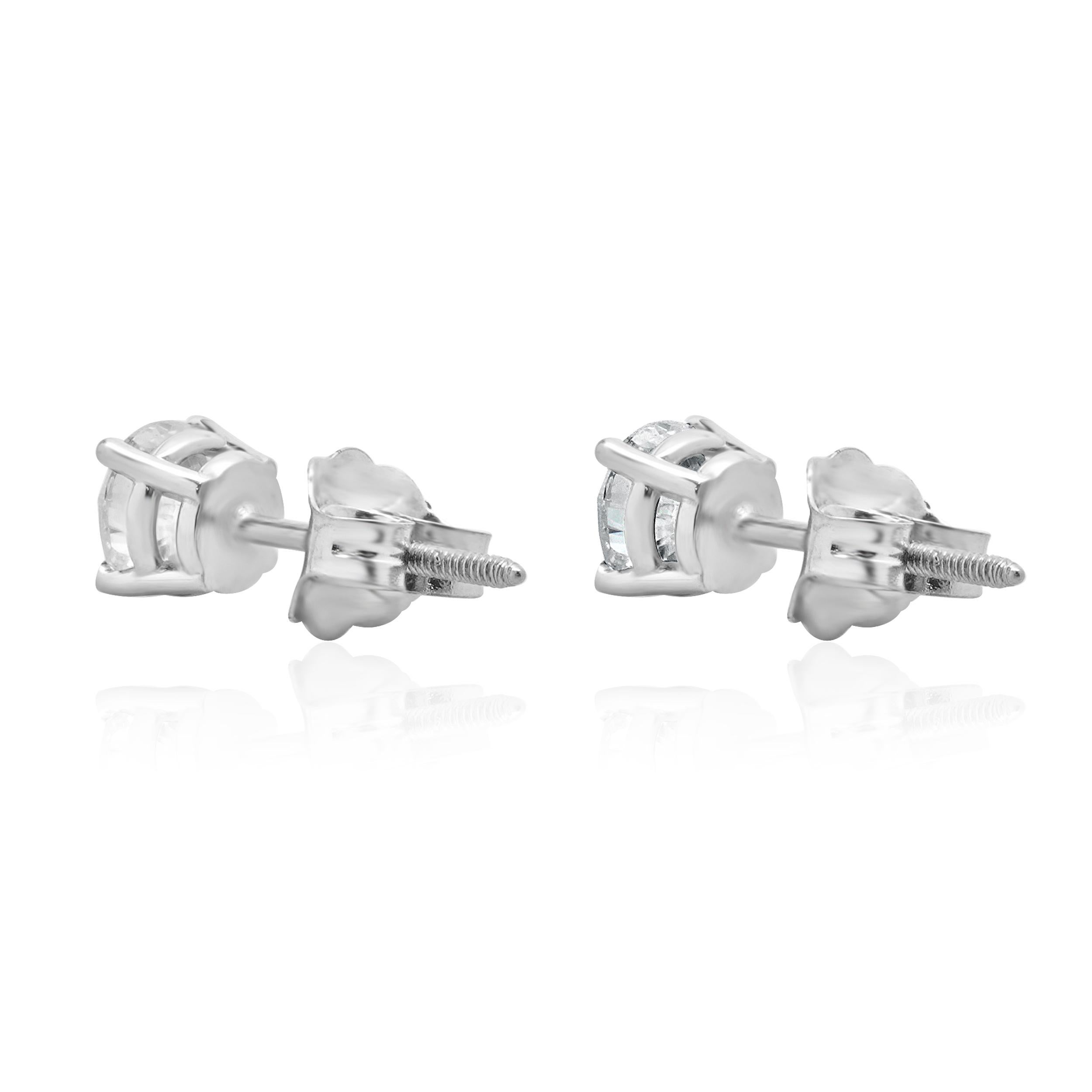 MATERIAL : Or blanc 14k
Diamants : 2 diamants ronds de taille brillant = 0,88cttw
Couleur : G / H
Clarté : I1-2
Dimensions : les boucles d'oreilles mesurent environ 4.8 mm de diamètre.
Fermetures : à vis
Poids : 0,97 grammes
