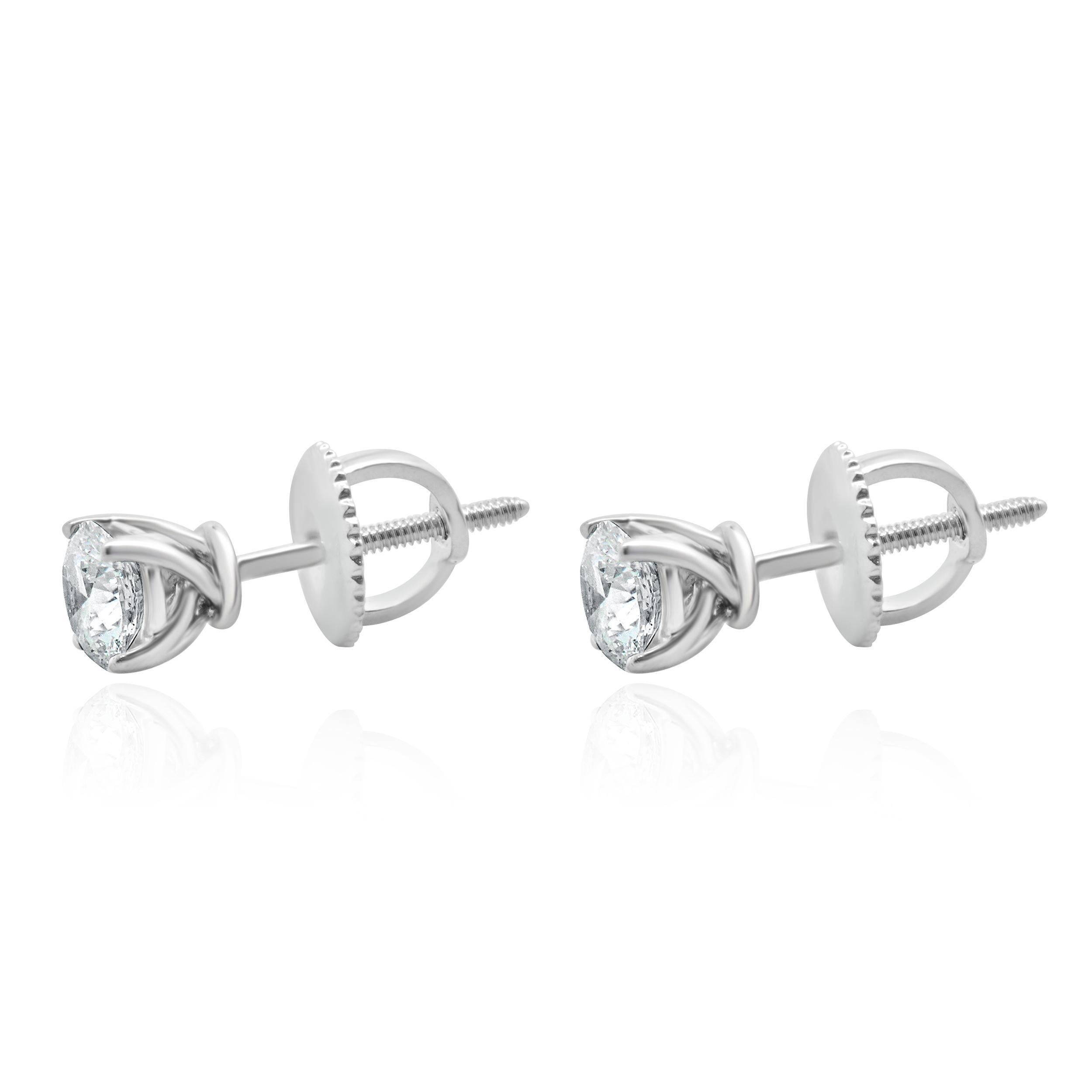 Matériau : Or blanc 14K
Diamants : 2 diamants ronds de taille brillant = 0,80cttw
Couleur : G/H
Clarté : I2
Dimensions : les boucles d'oreilles mesurent environ 5.50 mm de diamètre.
Fixations : dos vissés
Poids : 0,88 grammes