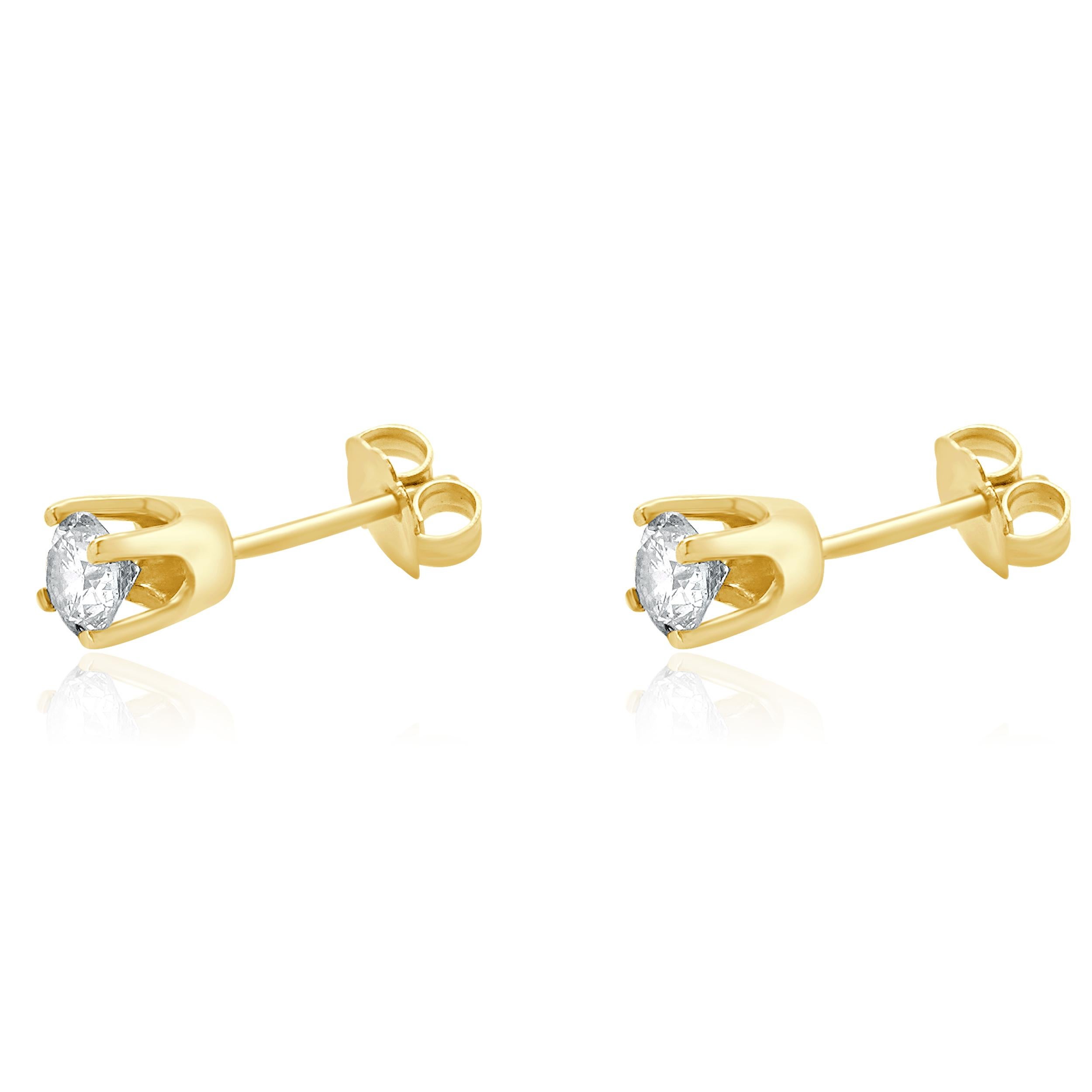 Matériau : Or jaune 14K
Diamants : 2 diamants ronds de taille brillant = 0,40cttw
Couleur : I
Clarté : I3
Dimensions : les boucles d'oreilles mesurent environ 4 mm de diamètre.
Fermetures : dos à friction
Poids : 0,88 grammes
