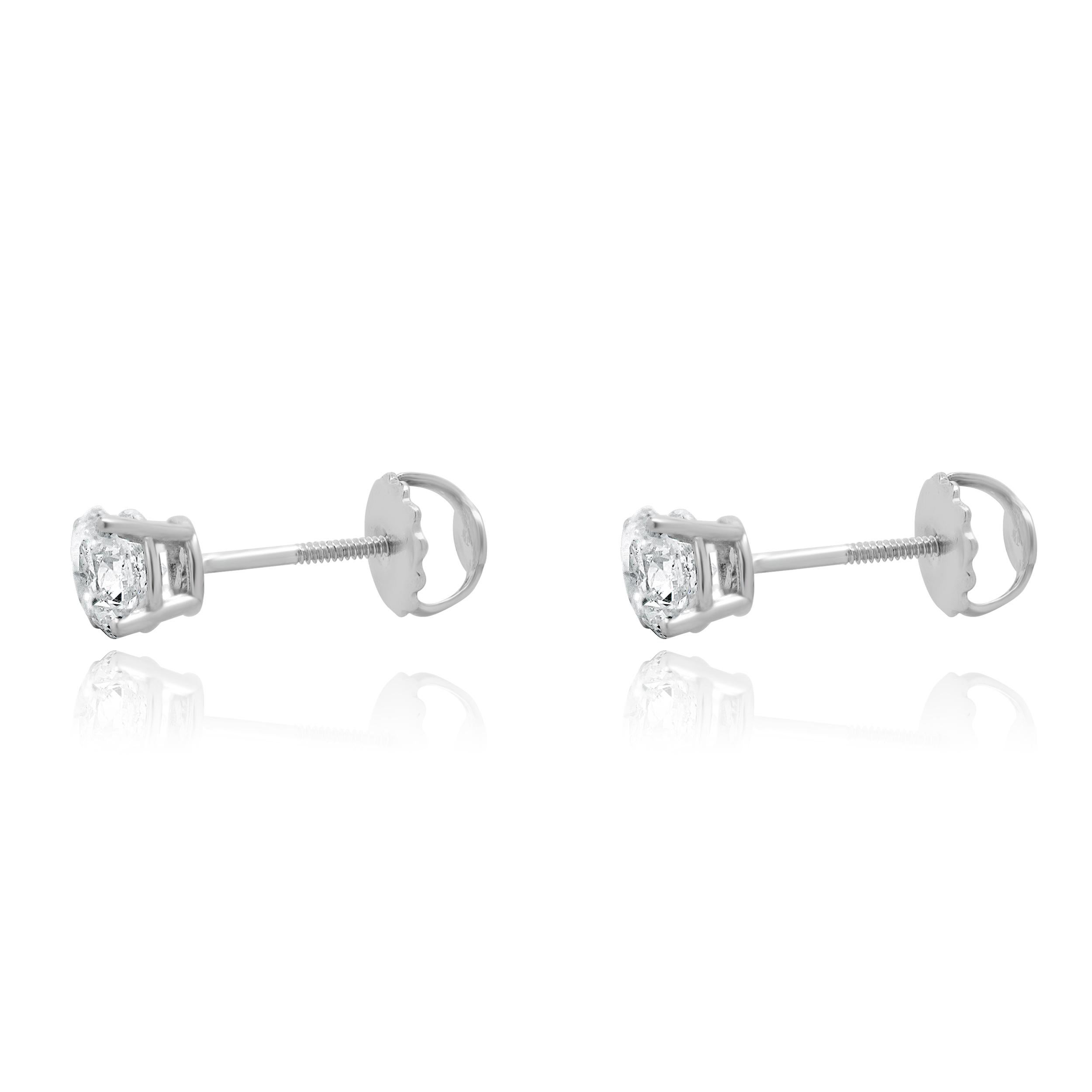Matériau : Or blanc 14K
Diamants : 2 diamants ronds de taille brillant = 1,05cttw
Couleur : G
Clarté : SI2
Dimensions : les boucles d'oreilles mesurent environ 5.13 mm de diamètre.
Fixations : dos vissés
Poids : 0,90 grammes
