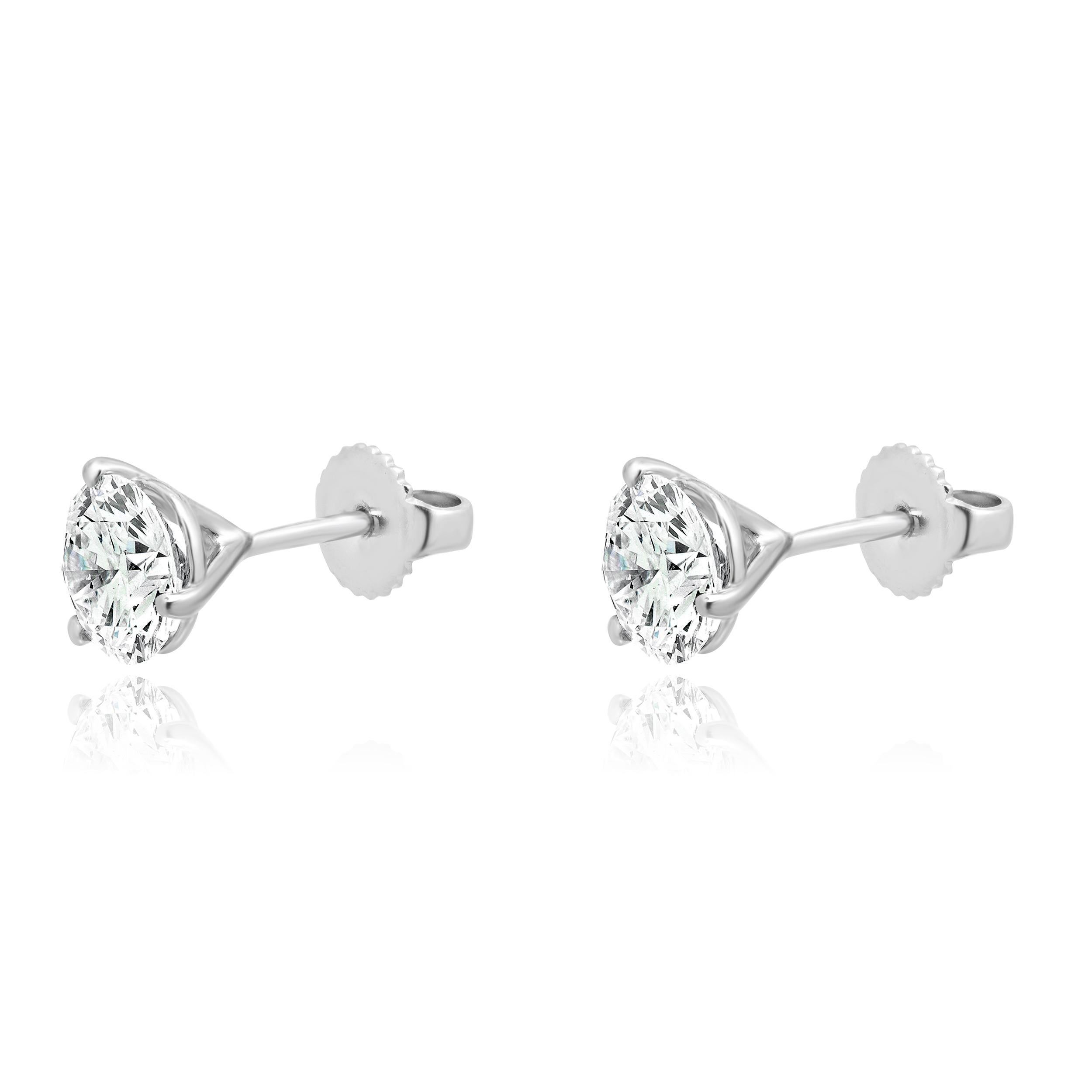 Matériau : Or blanc 14k
Diamants : 2 diamants ronds de taille brillant = 2.30cttw
Couleur : G
Clarté : SI1
Poids : 1.72 grammes

