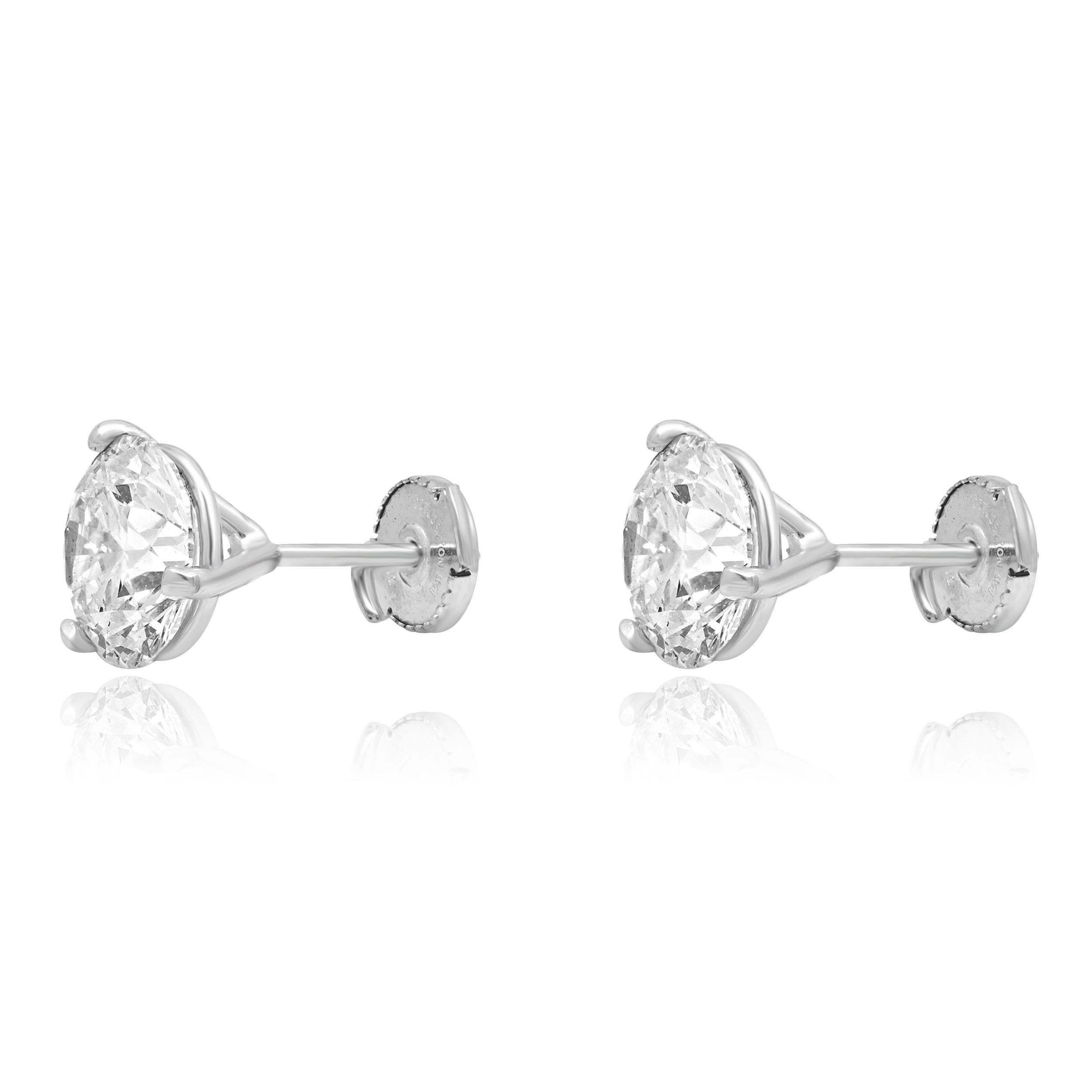 Matériau : Or blanc 14K
Diamant : 1 taille ronde brillante= 2.40cttw
Couleur : K.
Clarté : SI2
Diamant : 1 taille ronde brillante= 2.52cttw
Couleur : J
Clarté : I1
Dimensions : les boucles d'oreilles mesurent environ 9.5 mm de diamètre.
Fermeture :