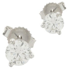 Clous d'oreilles en or blanc 14 carats avec diamants taille brillant rond