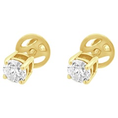 Orecchini con diamanti taglio brillante rotondo in oro bianco 14 carati