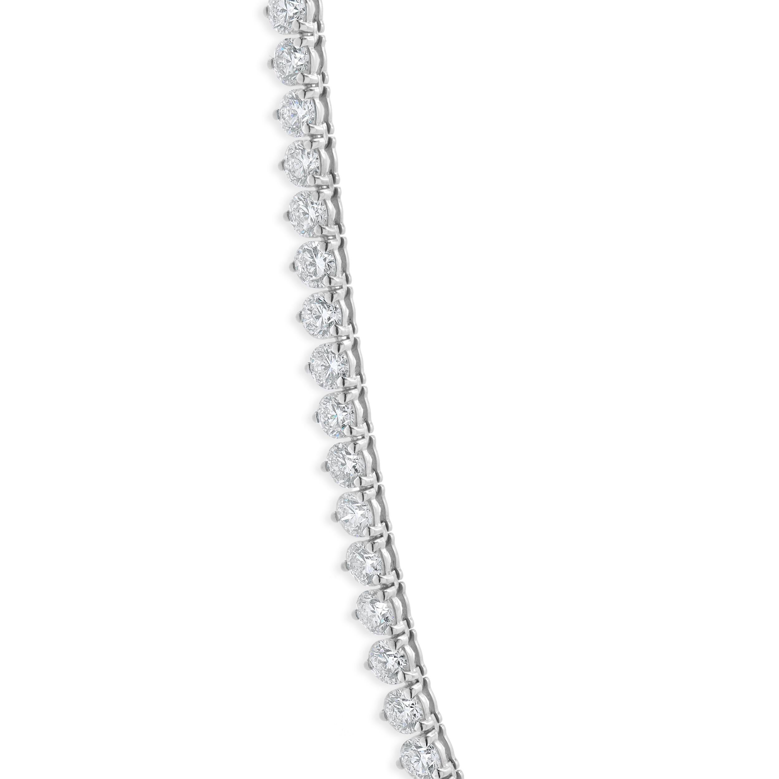 Designer: custom design
Material: 14K white gold
Diamond: 109 round brilliant cut = 21.07cttw
Color: F / G
Clarity: VS1-2
Dimensions: necklace measures 16.5-inches in length
Weight: 19.93 grams
