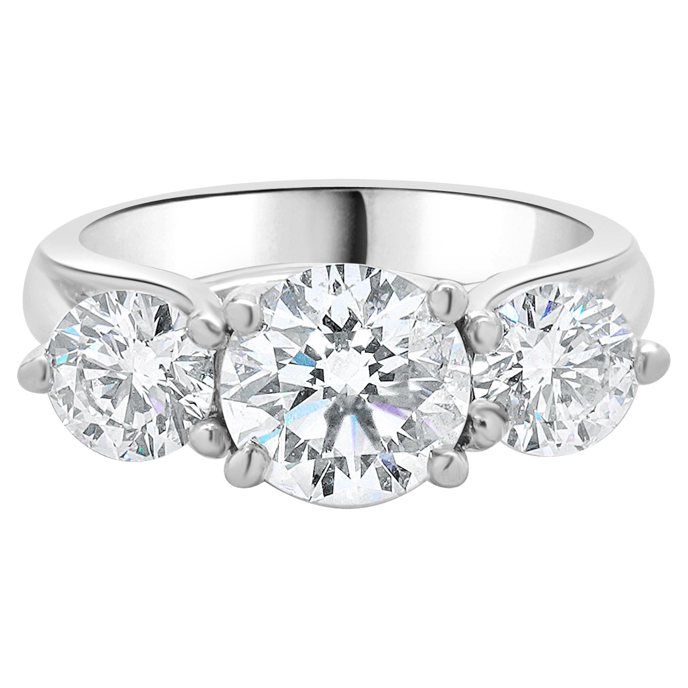18 Karat White Gold Round Brilliant Cut Three Diamond Engagement Ring