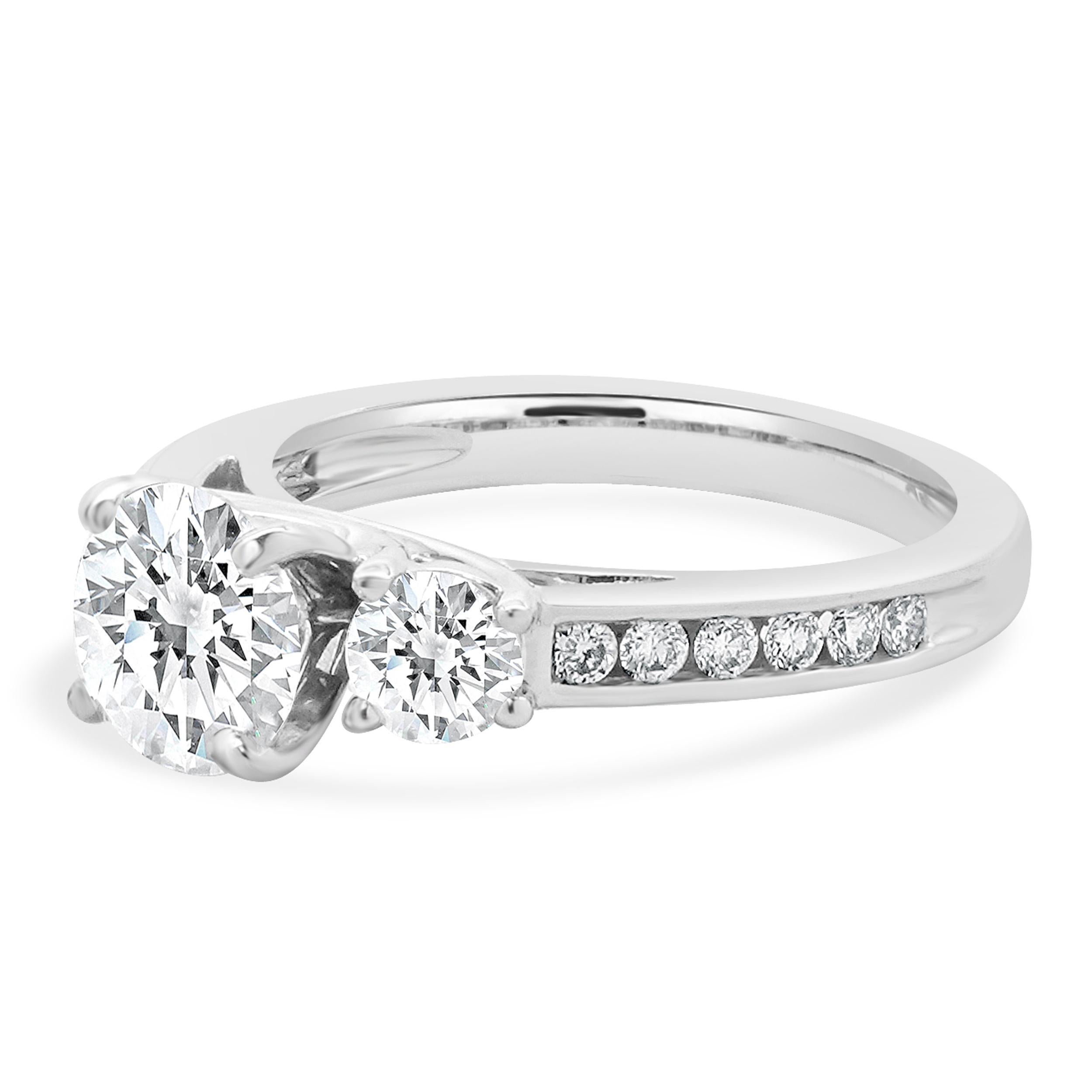 Material: 14K white gold
Center Diamond: round brilliant cut = 1.20ct
Color: I
Clarity: SI2
GIA: 2207136627
Diamond: 14 round brilliant cut = 0.62cttw
Color: I
Clarity: SI1
Ring Size: 5 (please allow up to 2 additional business days for sizing
