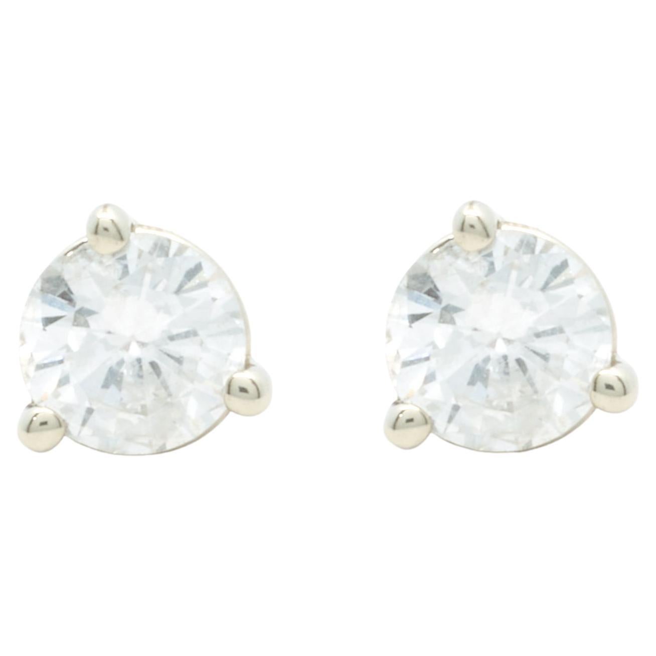 Clous d'oreilles en or blanc 14 carats avec diamants ronds brillants