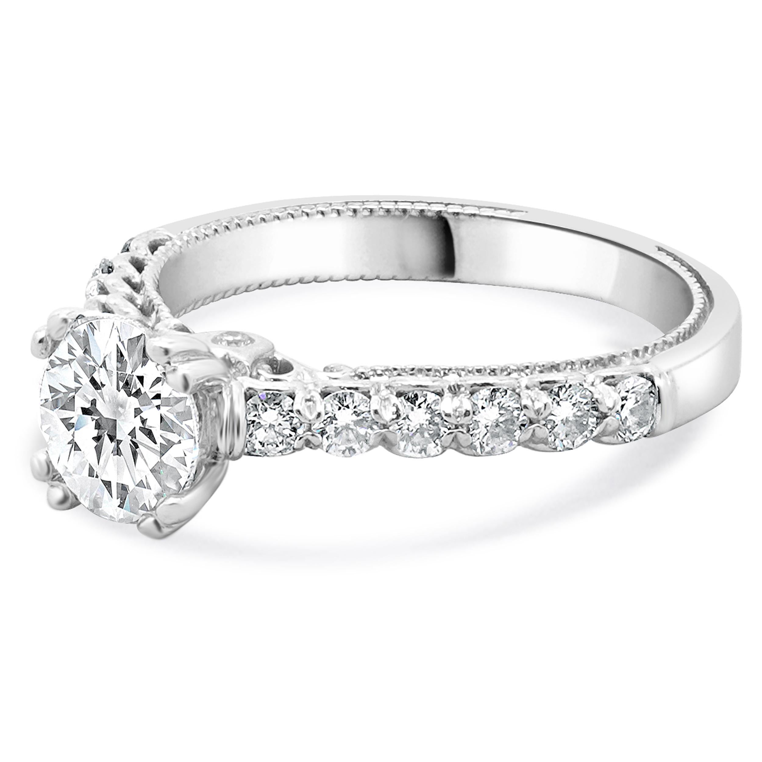 Designer: custom
Material: 14k white gold
Center Diamond: round brilliant cut = 1.20cttw
Color: F
Clarity: I2
Diamond: 14 round brilliant cut = 0.45cttw
Color: H
Clarity: SI2
Ring Size: 6 (please allow two additional shipping days for sizing