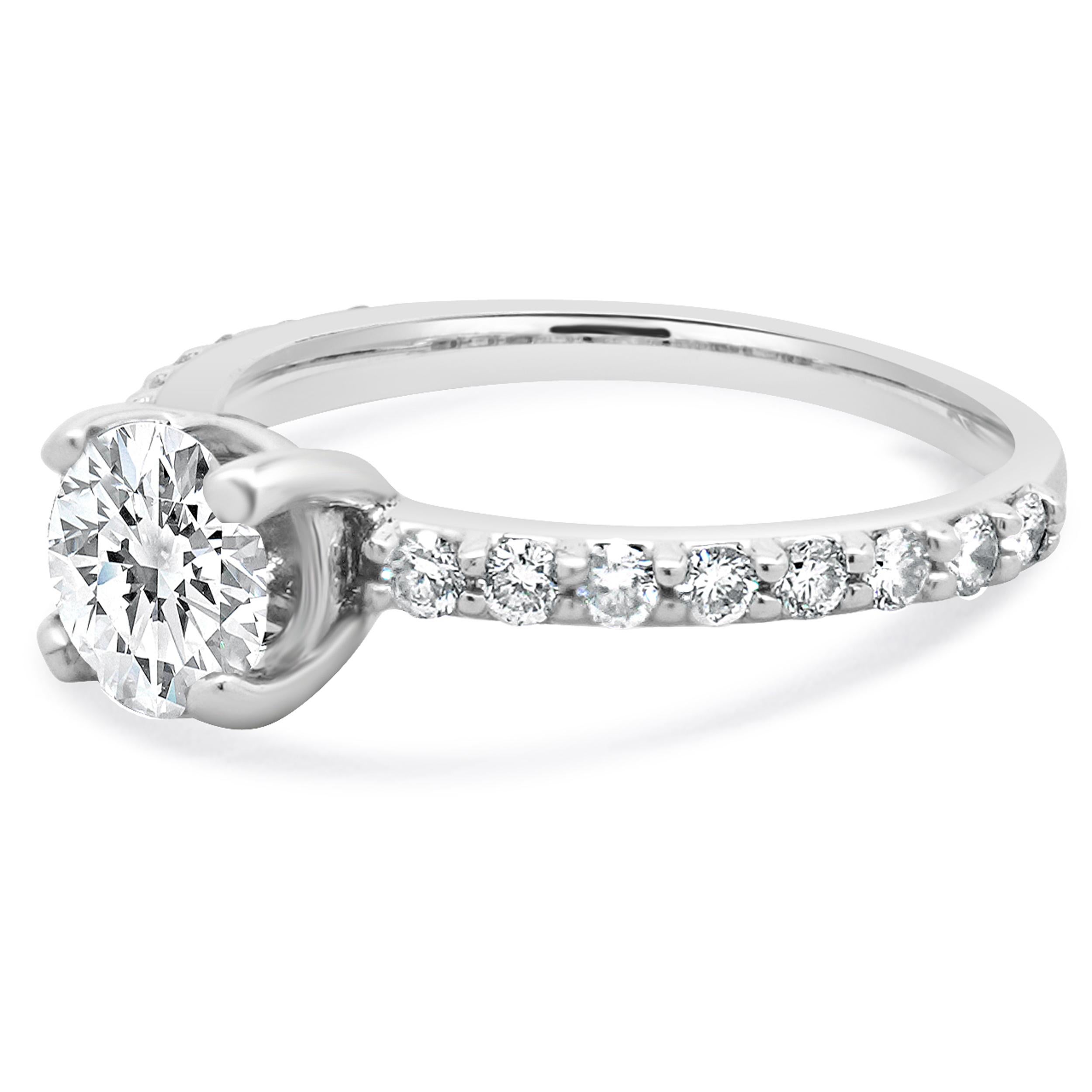 Material: 14K white gold
Center Diamond: 1 round brilliant cut = 1.00ct
Color: I
Clarity: SI3
Diamonds: 16 round cut = 0.48cttw
Color: I
Clarity: SI2
Ring Size: 7.5 (please allow up to 2 additional business days for sizing requests)
Weight: 3.10