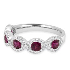 14 Karat White Gold Round Ruby and Round Diamond Crossover Halo Ring