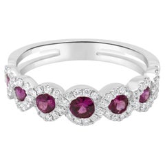 14 Karat White Gold Round Ruby and Round Diamond Crossover Halo Ring