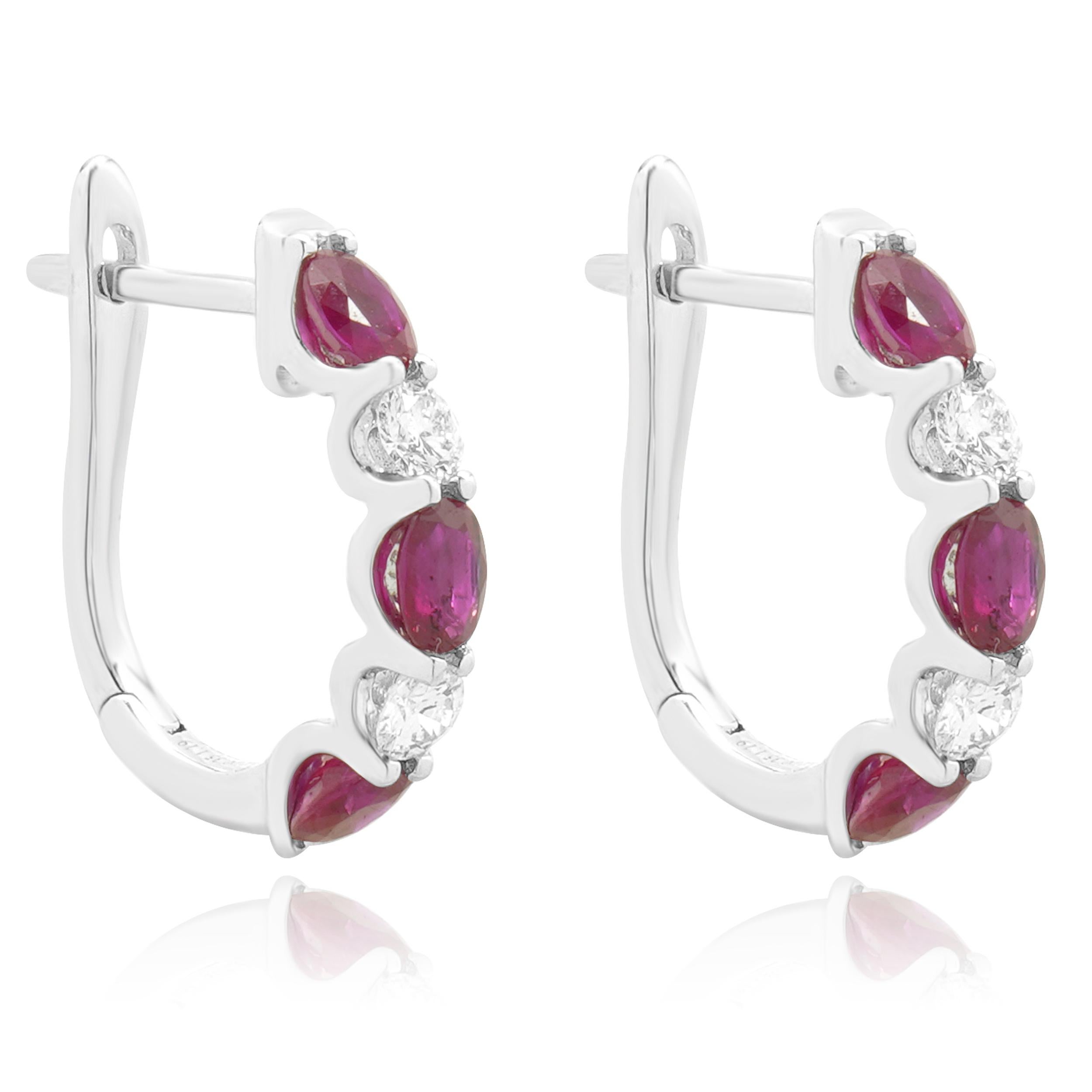 Designer: custom
Material: 14K white gold
Diamond: 4 round cut = 0.35cttw
Color: G
Clarity: VS
Ruby: 6 oval cut = 1.19cttw
Weight: 2.52 grams
