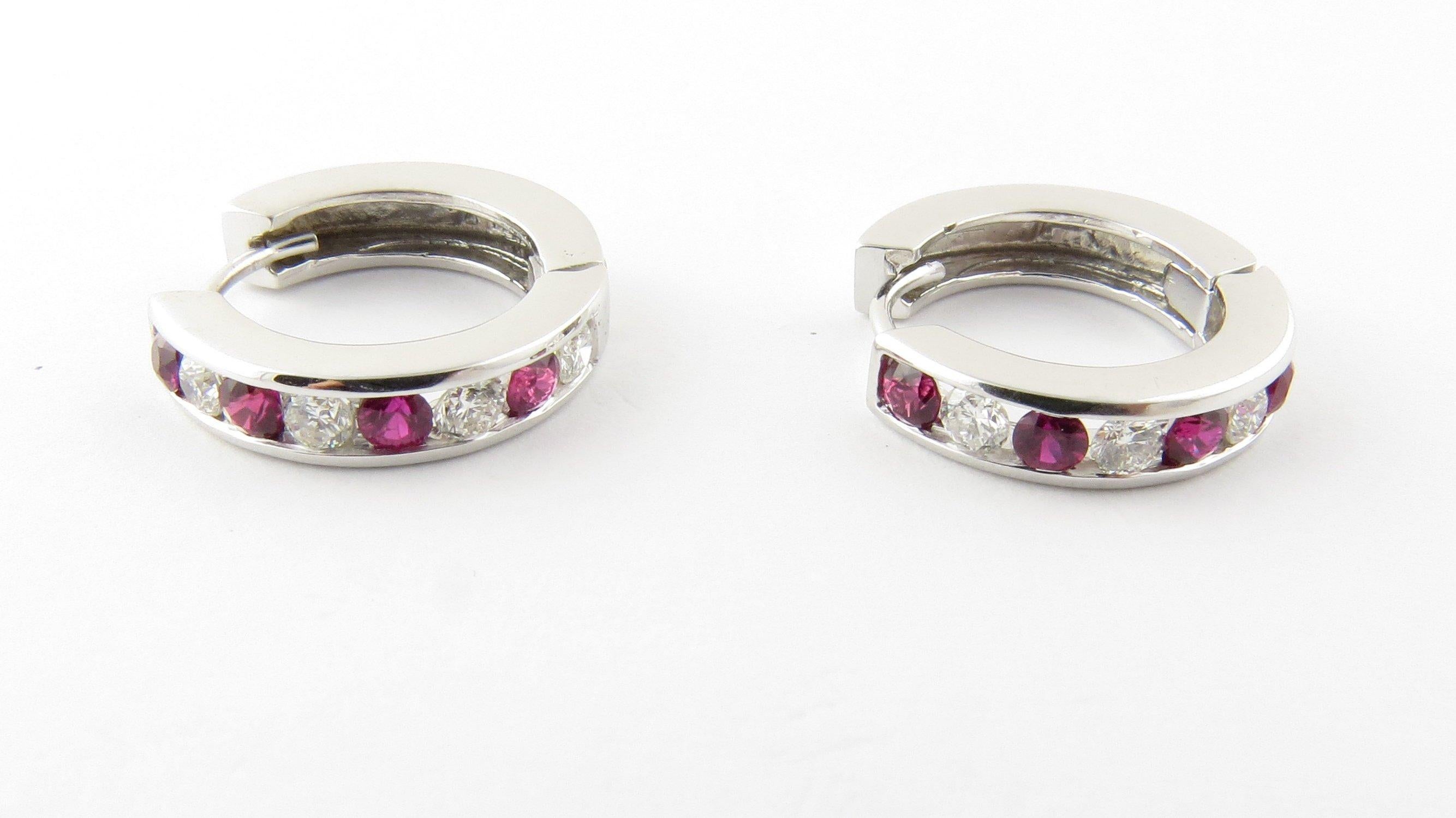 Vintage 14 Karat White Gold Ruby and Diamond Earrings- These lovely earrings each feature four round red rubies and four round brilliant cut diamonds set in polished 14K white gold. Approximate total diamond weight: .40 ct. Diamond color: G Diamond