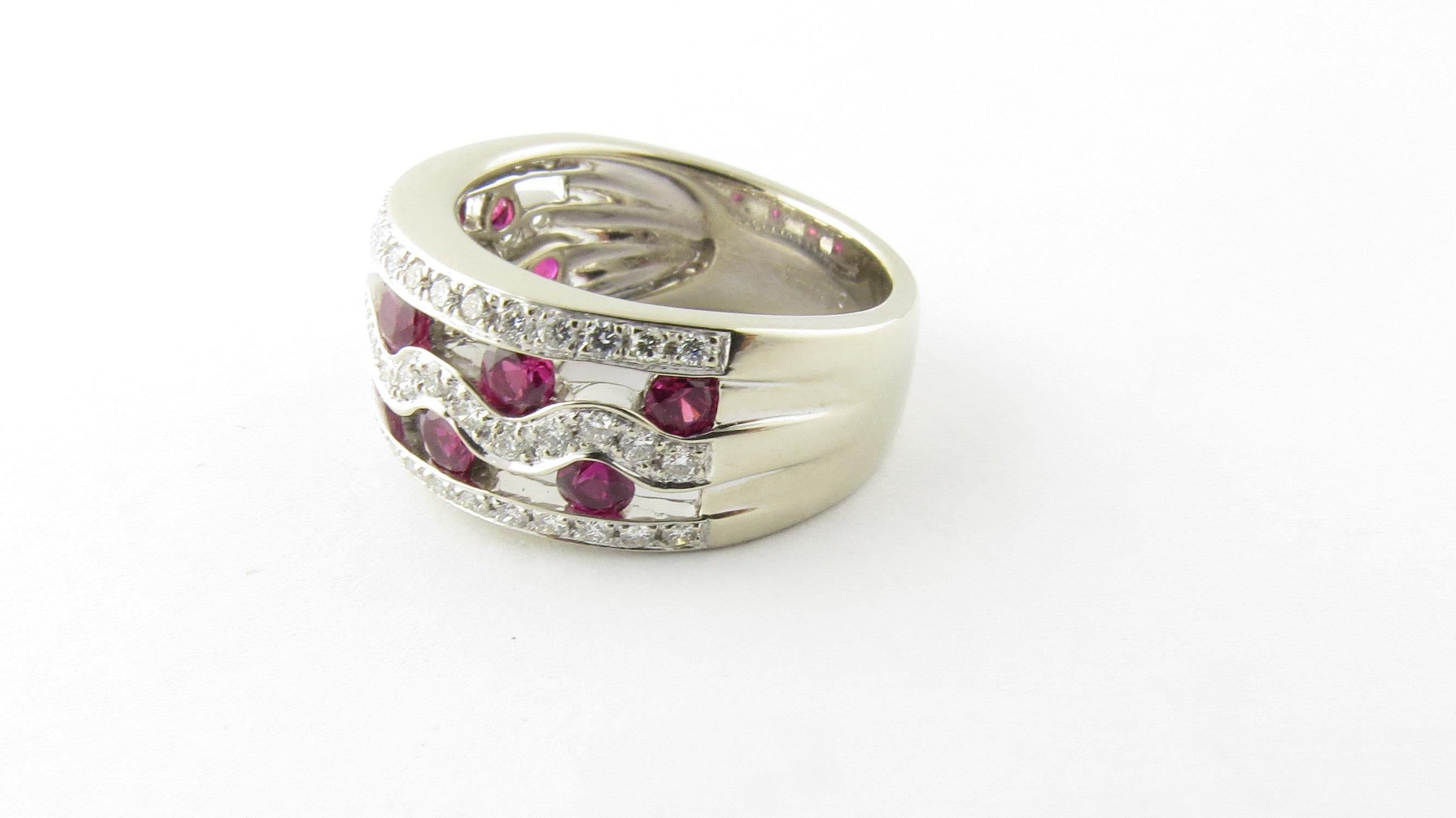 Vintage 14 Karat White Gold Pink Sapphires and Diamond Ring Size 6.5- 
This stunning ring features 57 round brilliant cut diamonds and ten round genuine pink sapphires set in classic 14K white gold. Shank measures 6 mm. Front width: 10 mm.