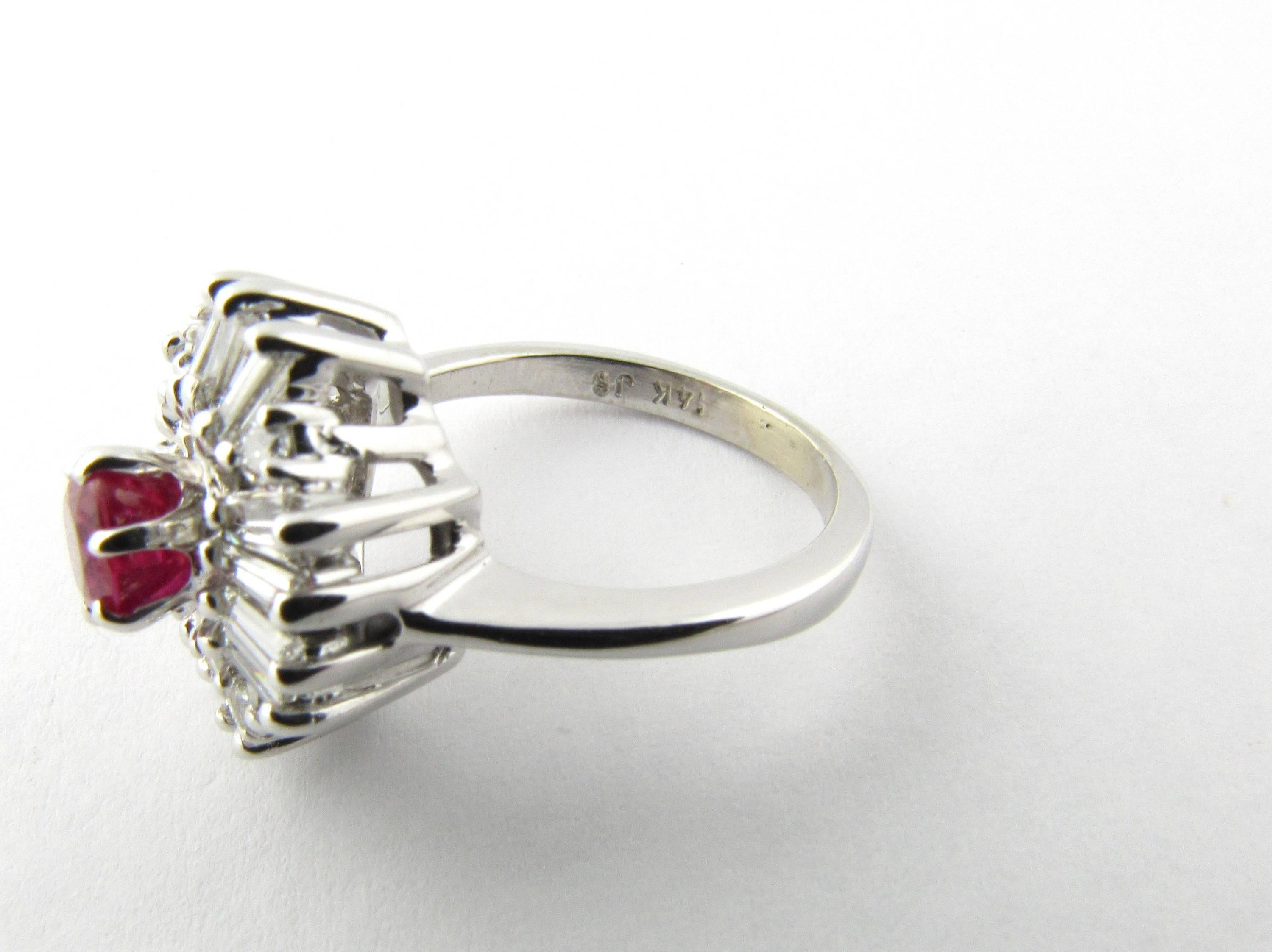 Vintage 14 Karat White Gold Ruby and Diamond Ring Size 4-

This stunning ring features one round genuine Ruby (5 mm) surrounded by 14 baguette diamonds and four round brilliant cut diamonds set in 14K white gold.

Top of ring measures 14