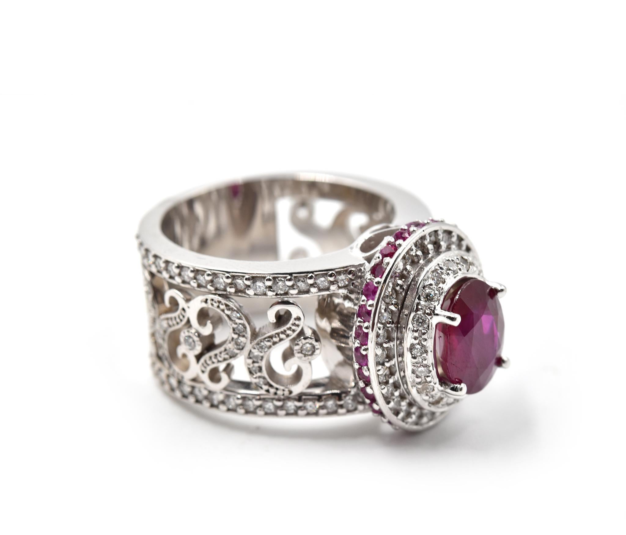 Designer: custom design
Material: 14k white gold
Ruby: oval cut= 2.07ct (no heat)
Ruby Melee: round cut =0.37cttw
Diamonds: 134 round brilliant = 1.20cttw
Color: G
Clarity: VS
Ring Size: 7 ¾ (please allow two additional shipping days for sizing