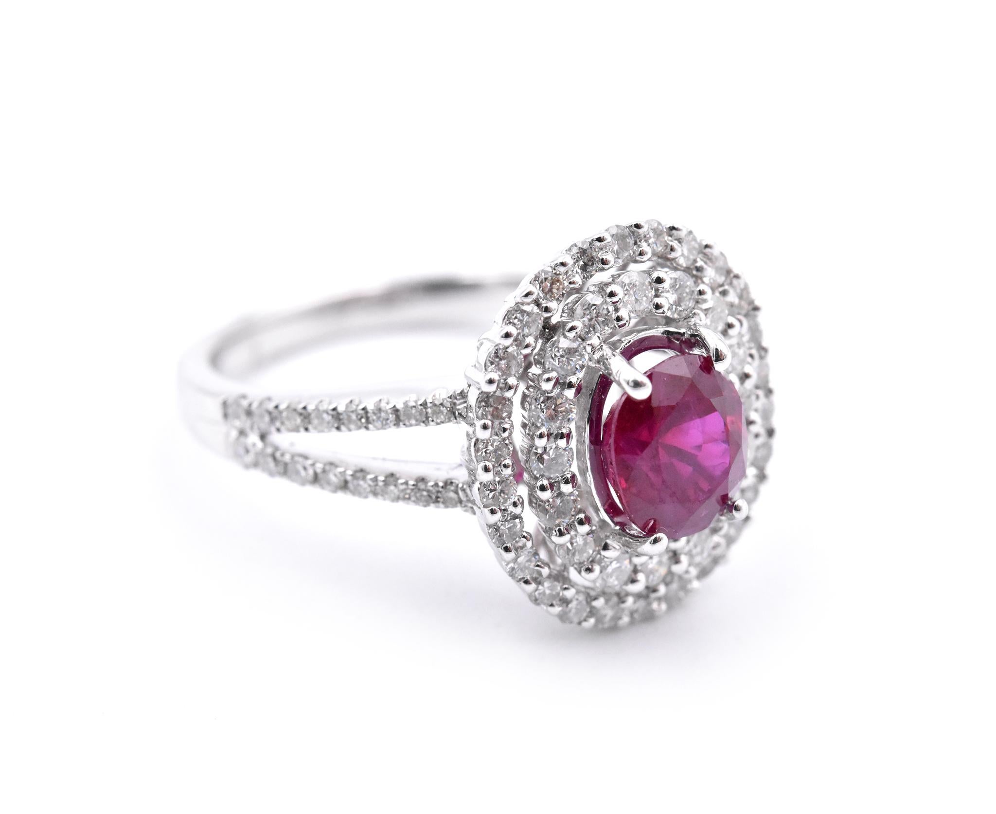 Designer: custom design
Material: 14k white gold
Gemstones: Ruby = 1.42ct Oval
Certification: AGI 25346
Diamonds: 75 round brilliant cuts = .94cttw
Color: F
Clarity: VS2-SI
Ring Size: 7.5 (please allow two additional shipping days for sizing